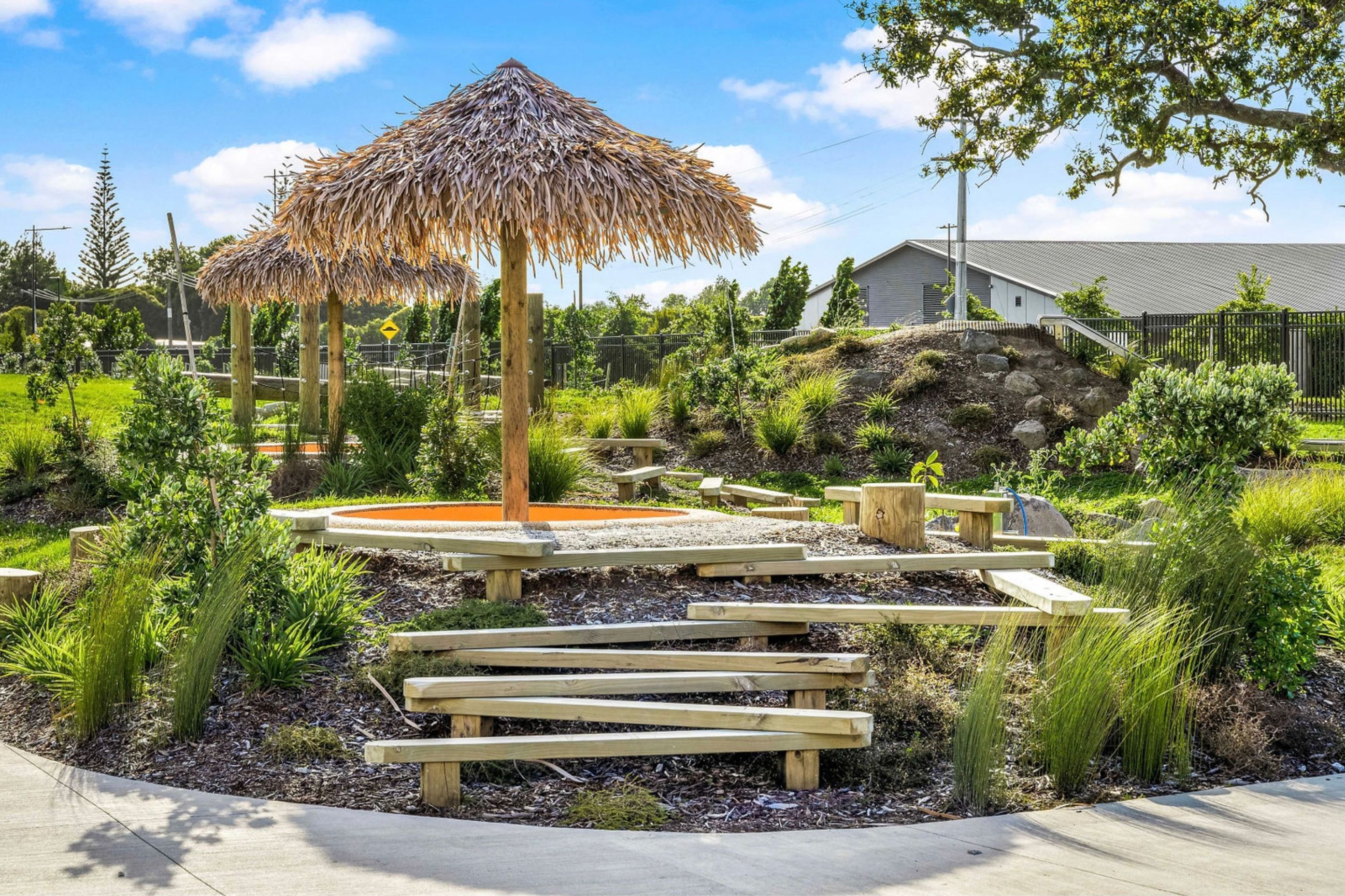 The different levels, textures, and plant life used in pāpaka playground encourage a connection with nature.