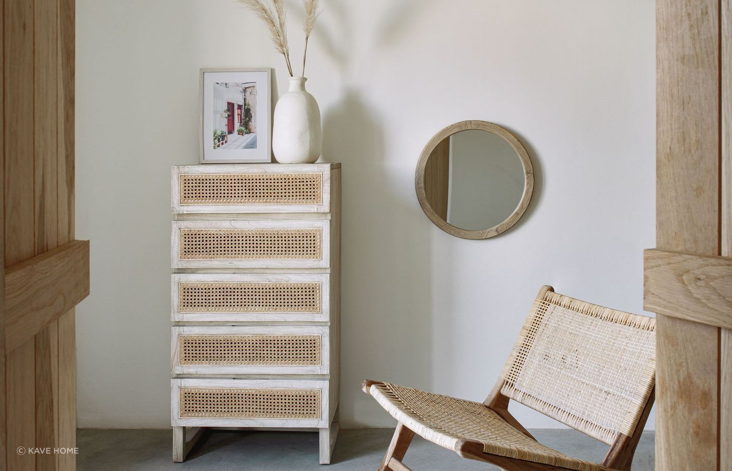 Wooden frames and rustic charm personify the Alum Round Solid Mindi Wood Mirror