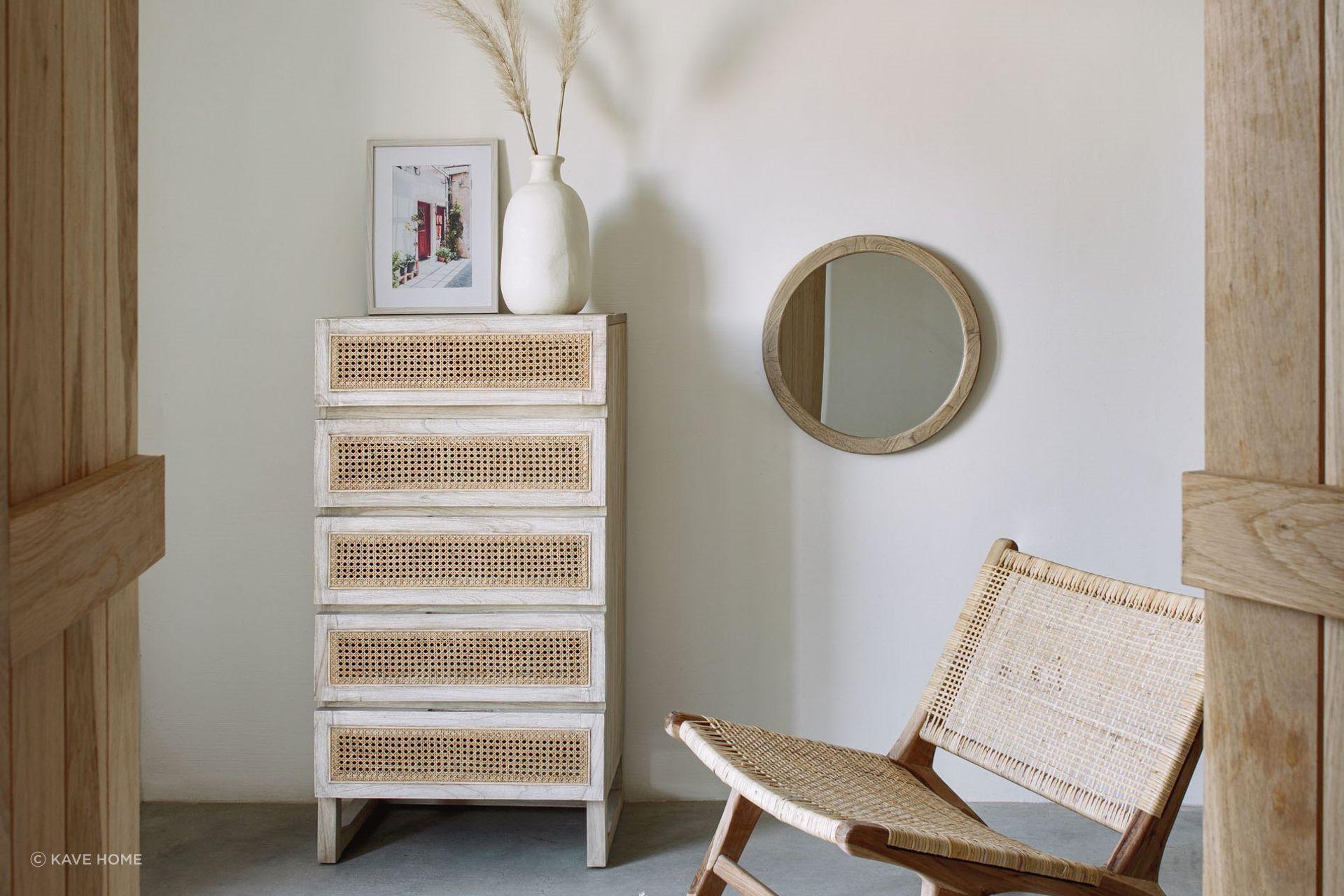 Wooden frames and rustic charm personify the Alum Round Solid Mindi Wood Mirror