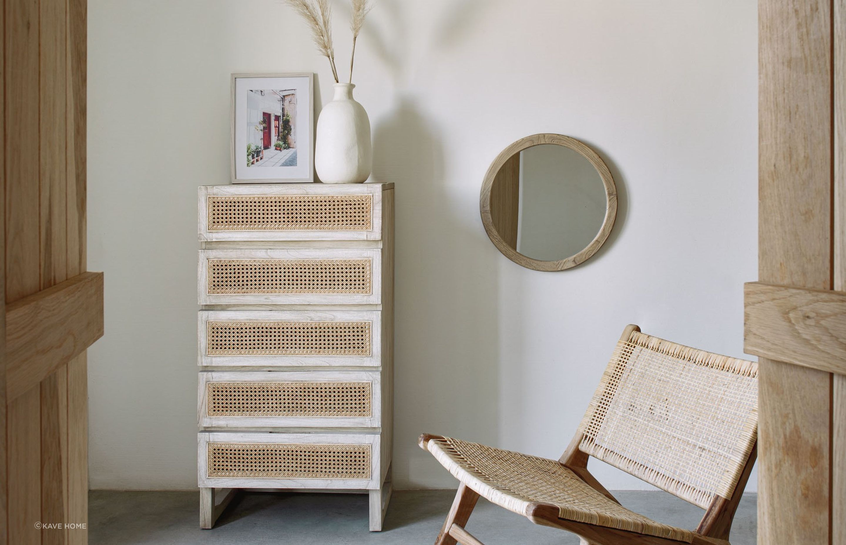 Wooden frames and rustic charm personify the Alum Round Solid Mindi Wood Mirror
