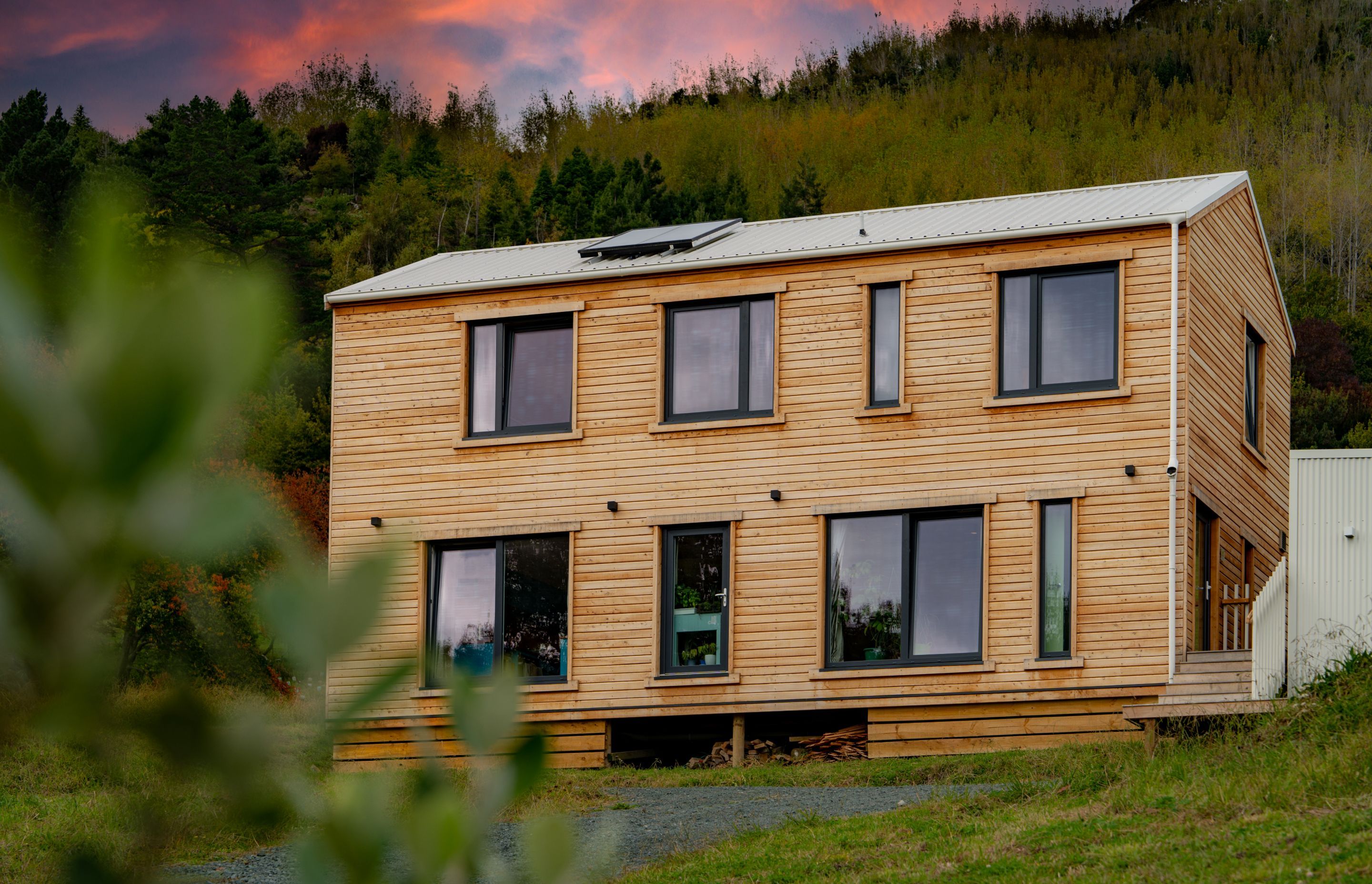 The home is clad in macrocarpa weatherboards harvested and milled only 45 minutes down the road.