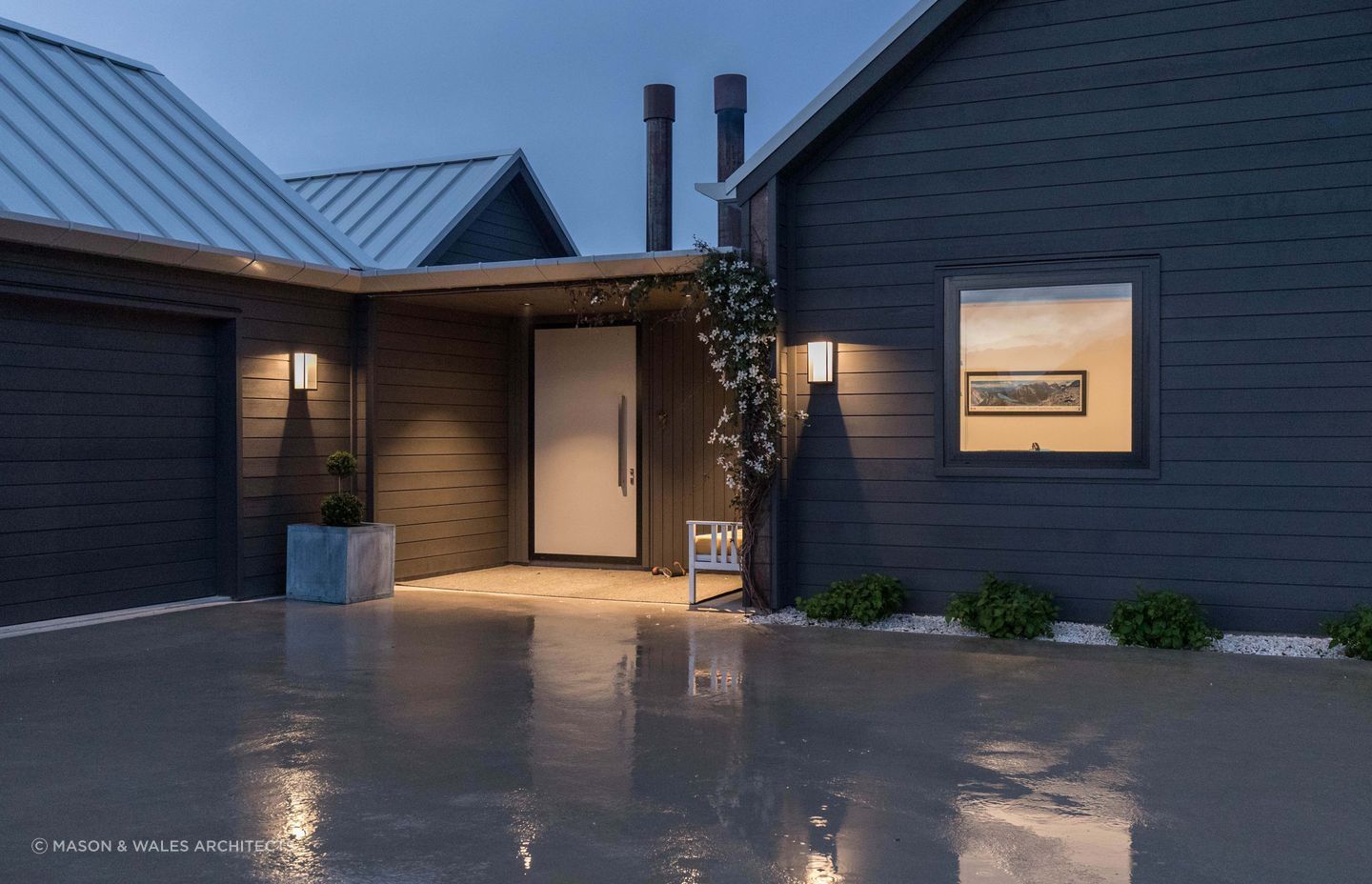 Flowering vines are the perfect complement to the entrance of this Wakatipu Basin home