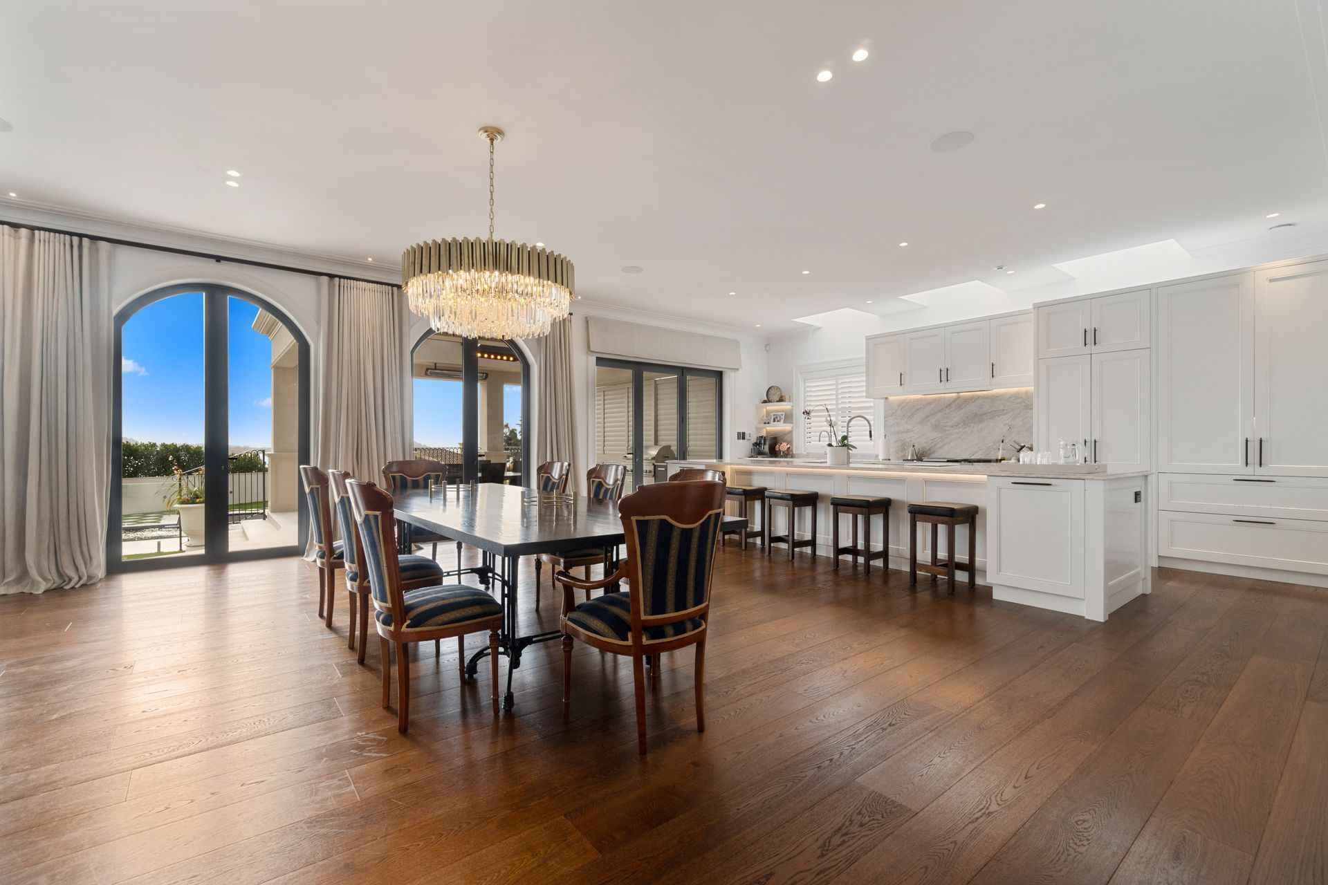 A grand Italianate home built with a glass floor