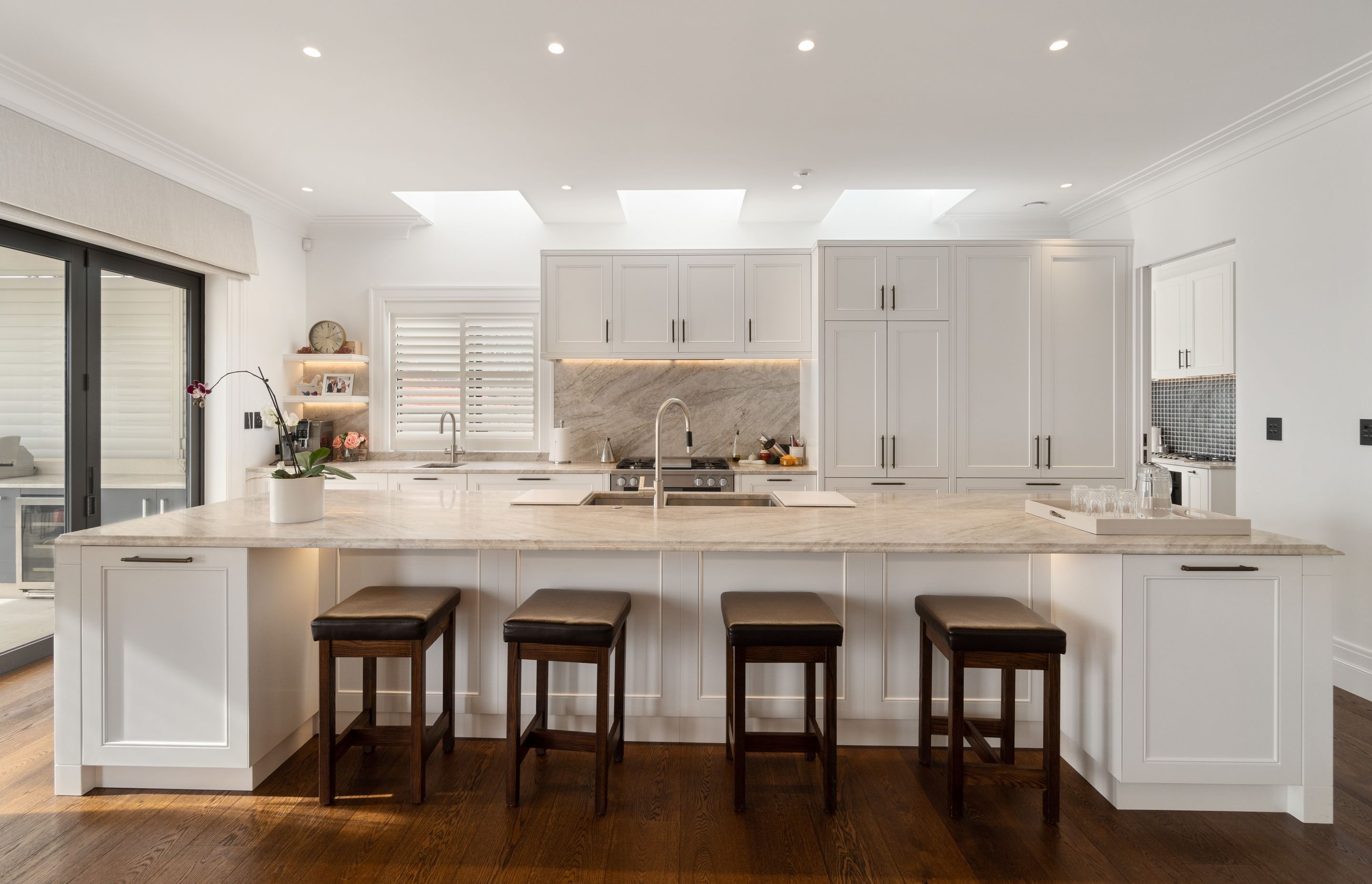 A grand Italianate home built with a glass floor