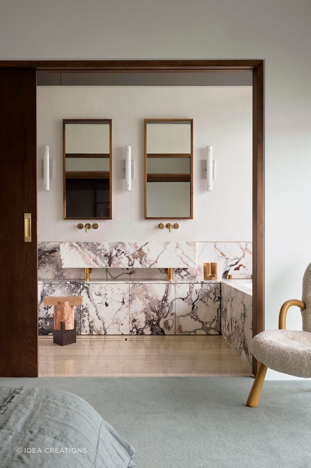 Matching mirrors look fantastic in bathrooms that feature more than one sink. Featured project: Gunnamatta House