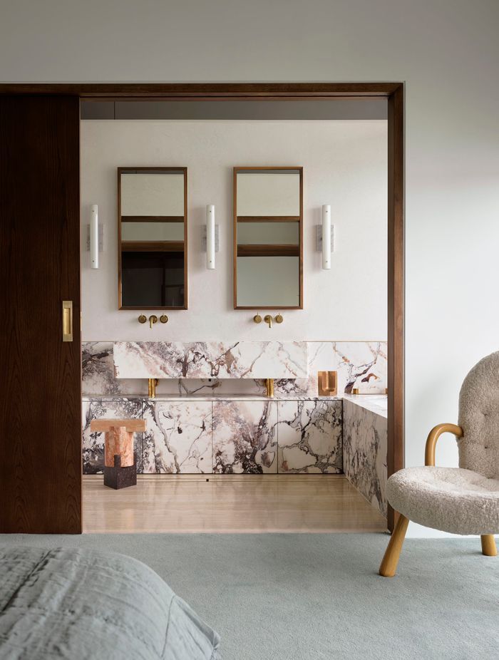 Matching mirrors look fantastic in bathrooms that feature more than one sink. Featured project: Gunnamatta House