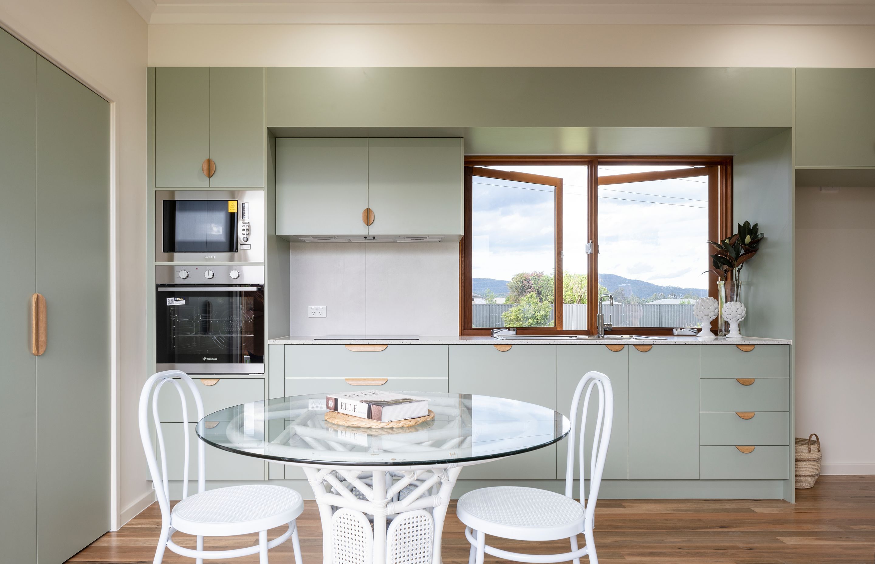 Wide doors, ambulant rails, lever handles, and ideal heights for appliances are some of the ageing-in-place features in this home | Auntie's Hut by 4305 Design | Photography by Angus Martin