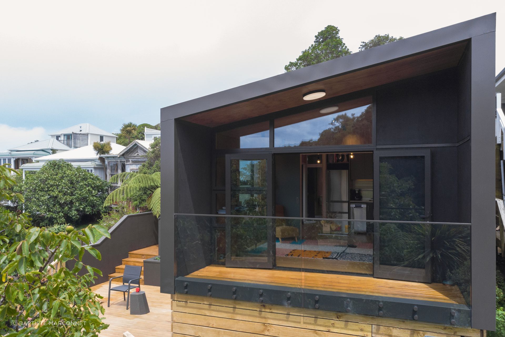 This porch module functions as an extension to the multi-use module, providing covered outdoor living space.
