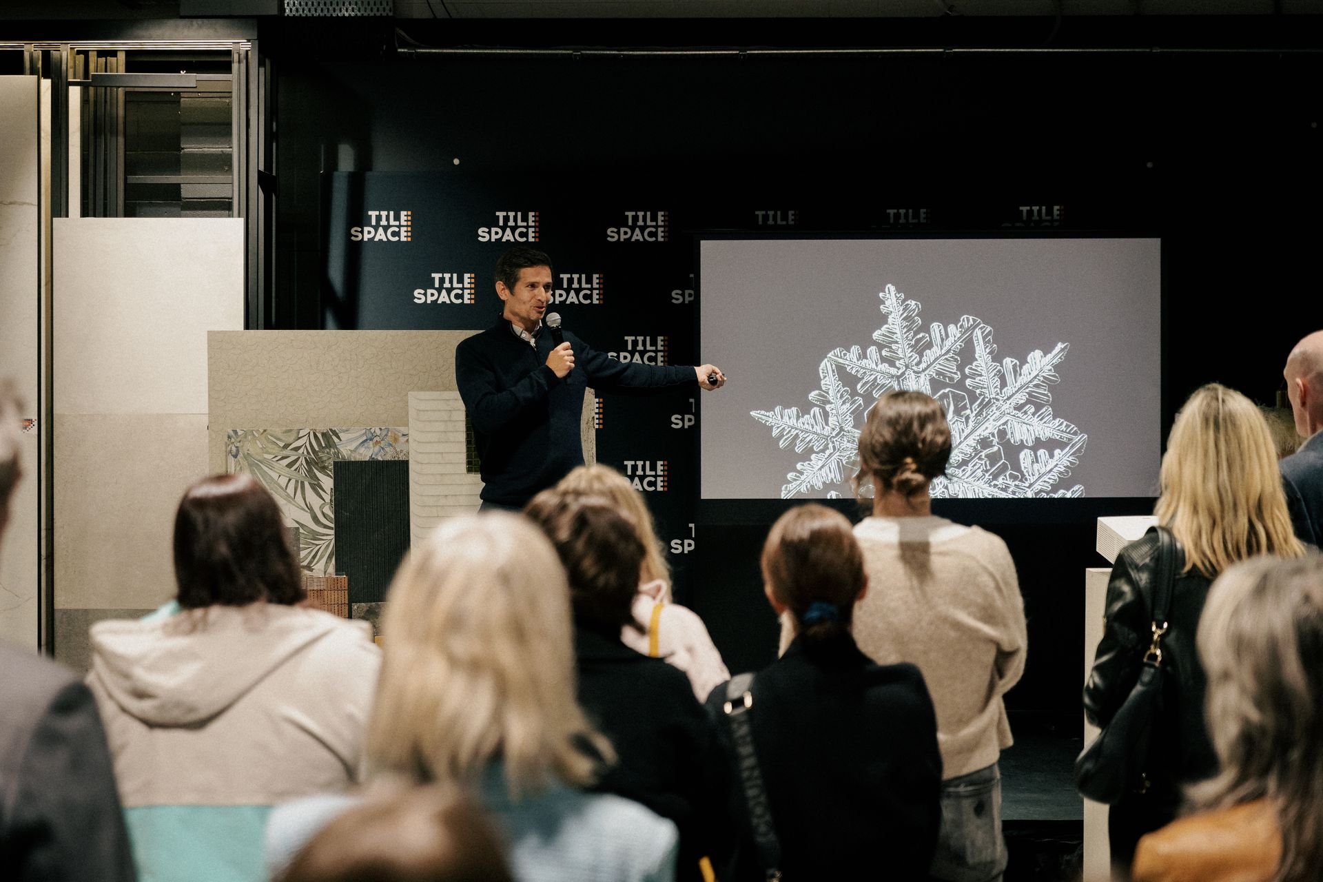 Tom engages with the crowd at Tile Space