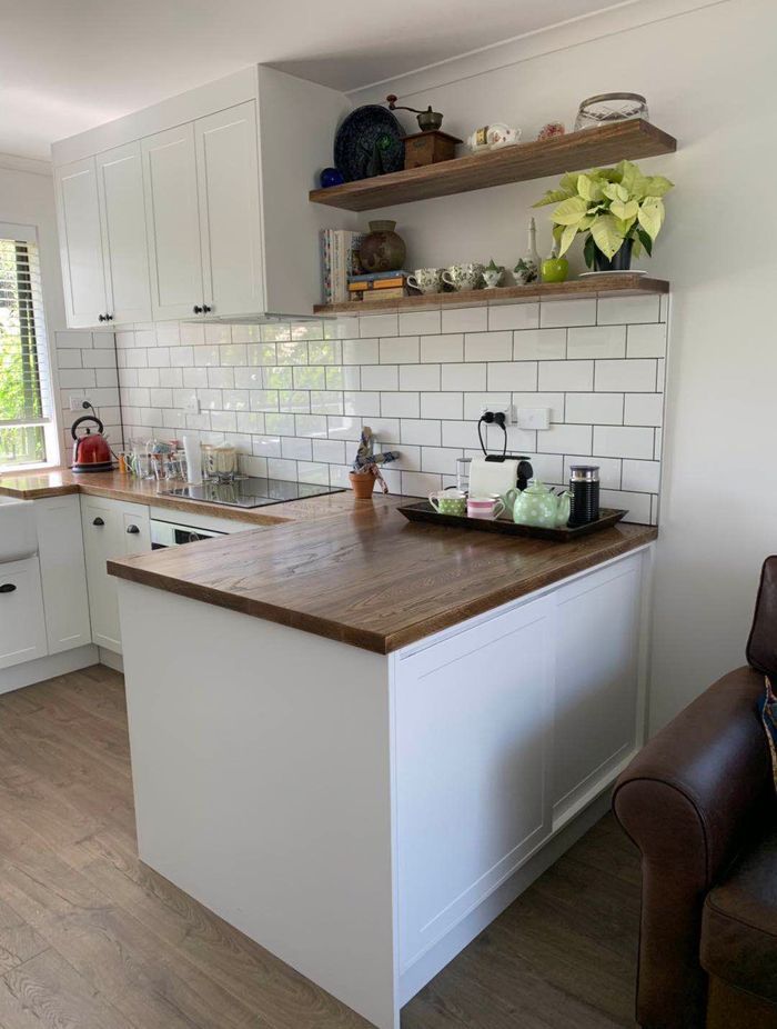 Kitchen renovation in South Auckland: Floating open shelves were added  to increase storage and add a design element to the kitchen.