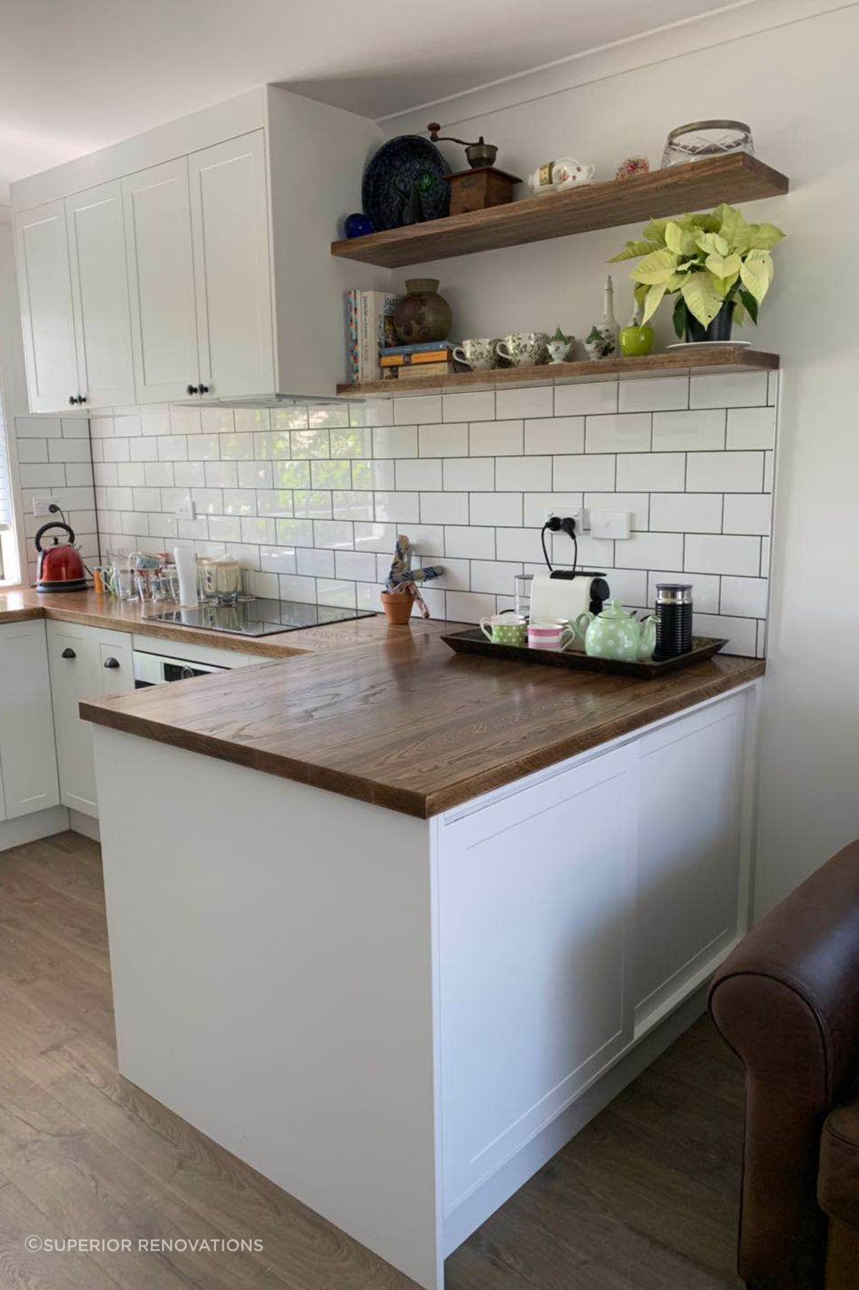 Kitchen renovation in South Auckland: Floating open shelves were added to increase storage and add a design element to the kitchen.