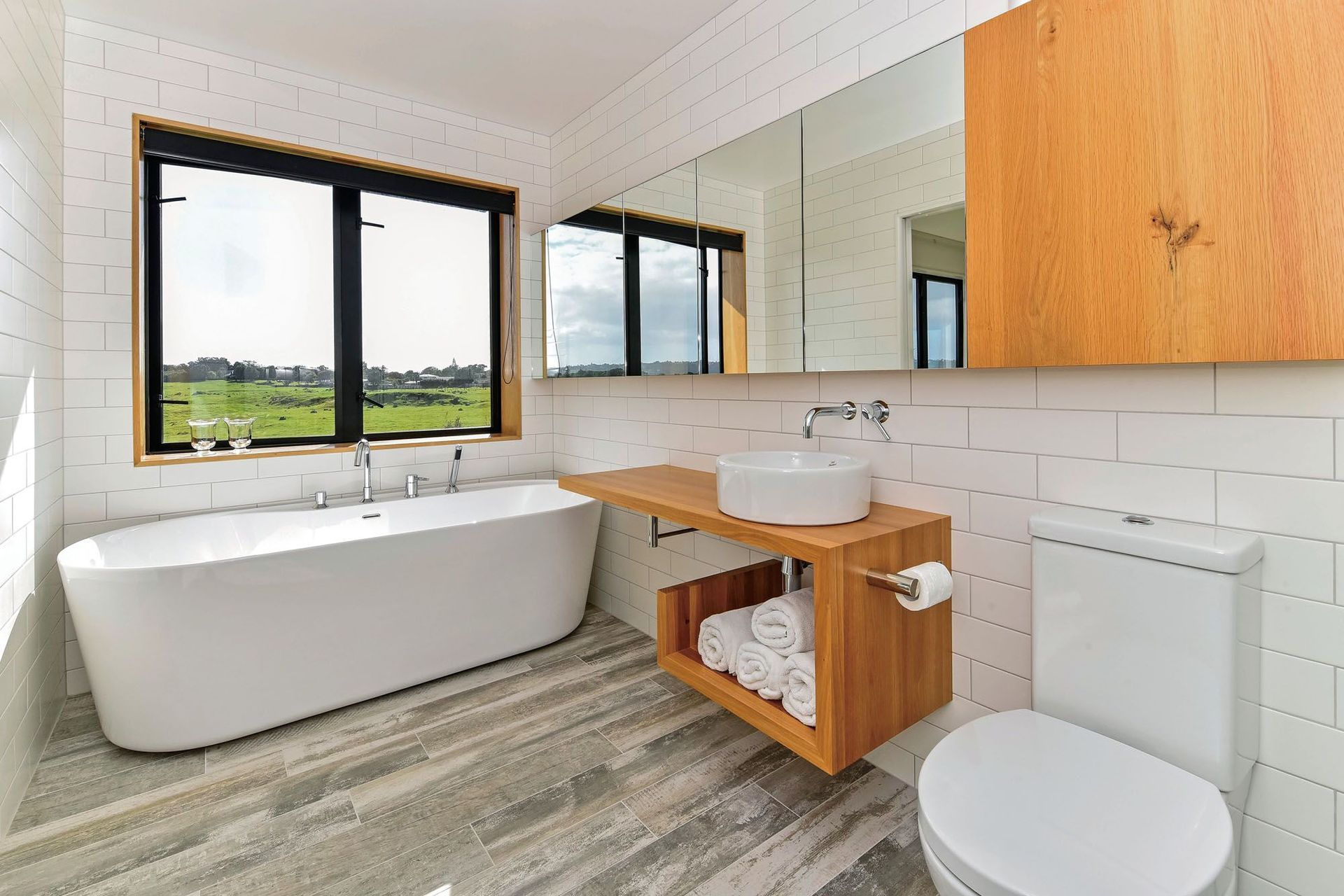 The natural colour and grain of the American Oak Vanity brings comfort and warmth to any bathroom space.