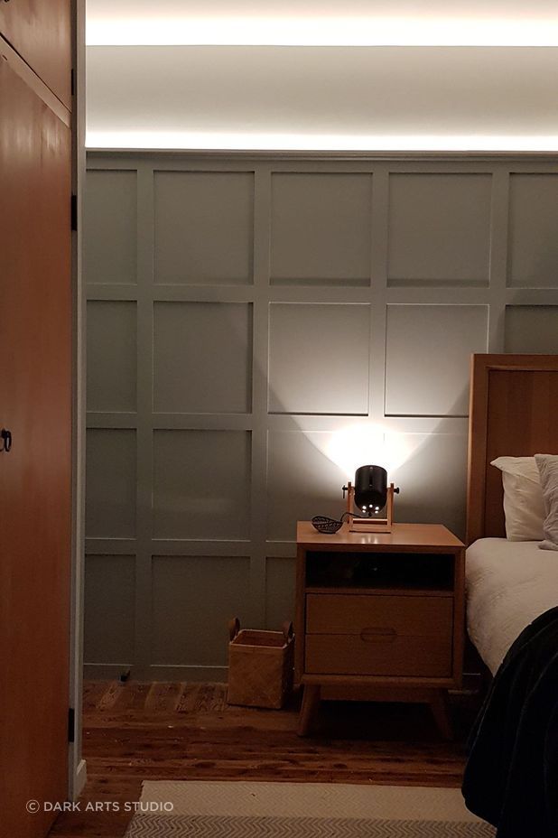Darkarts Studio outfitted this bedroom with atmospheric and practical lighting with multiple colour temperatures.