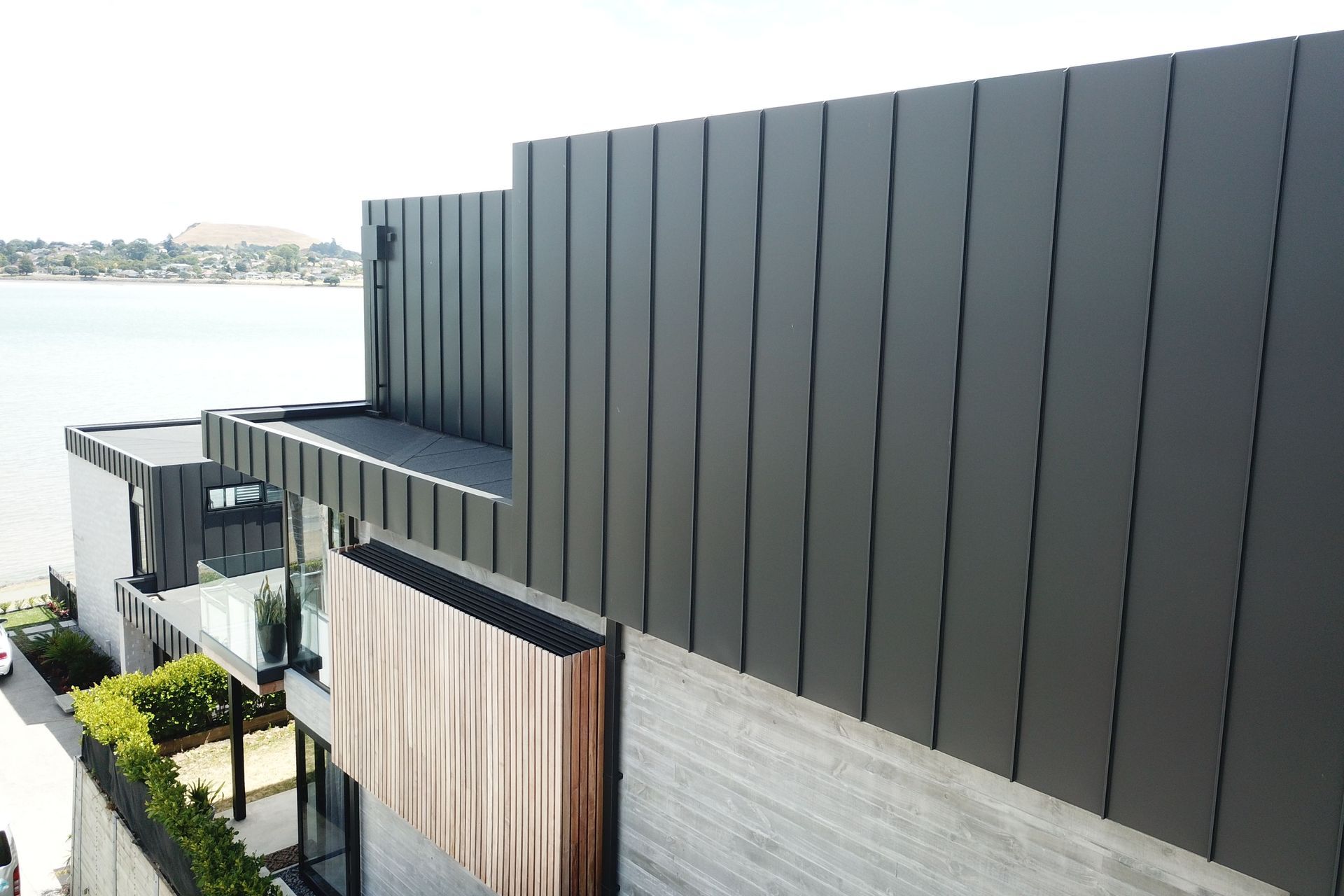 Options like this Ultra Matte Grey Black Premium Pre-Coated Aluminium solution from Ambro Metals has a great lifespan with little maintenance required.