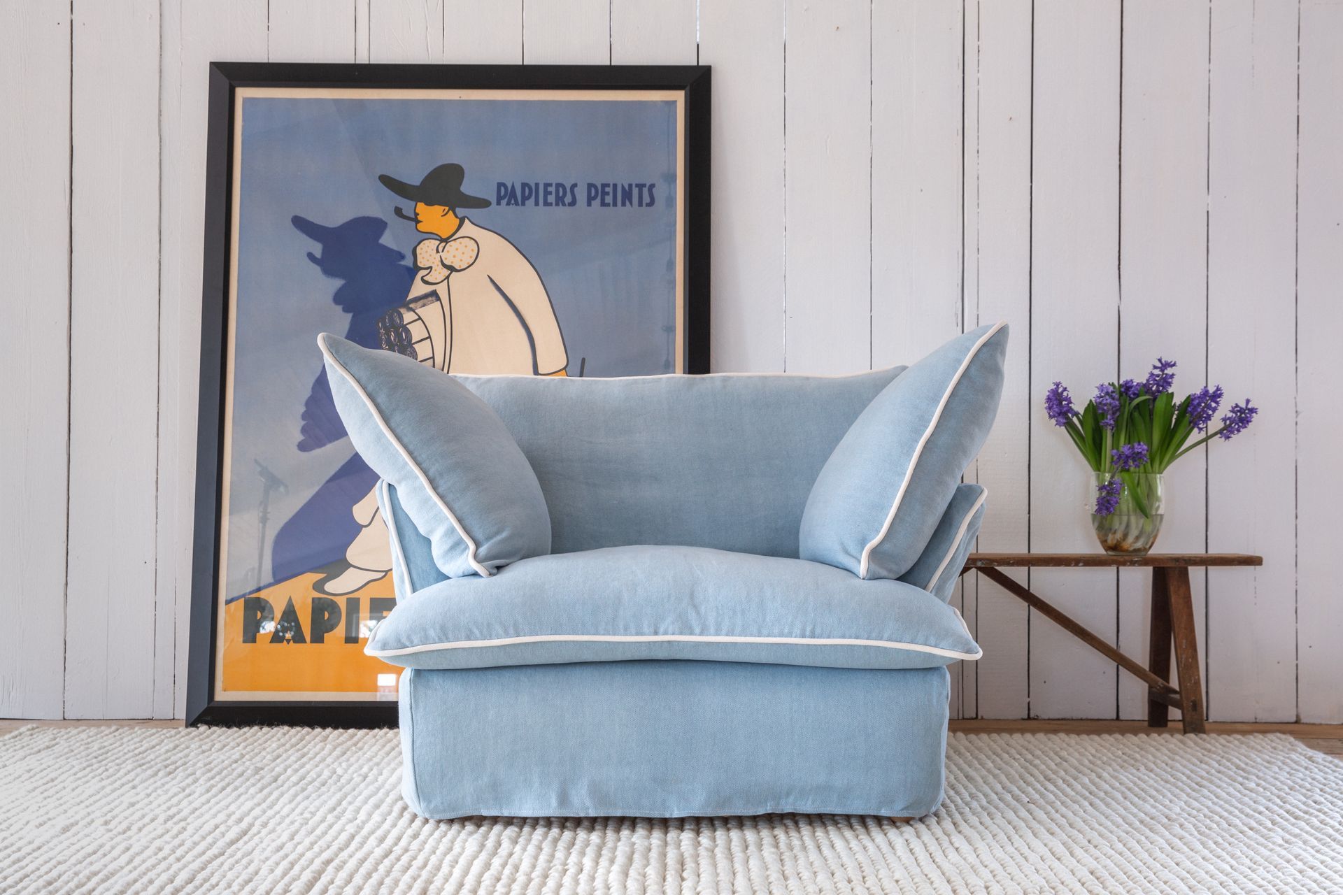 The cushions on this Maker&Son 'Marnie' armchair, contain two ‘duvets’ filled with a mixture of ethically sourced feathers and down, and between these ‘duvets’ sits a natural latex core, which helps keep the cushions' shape.