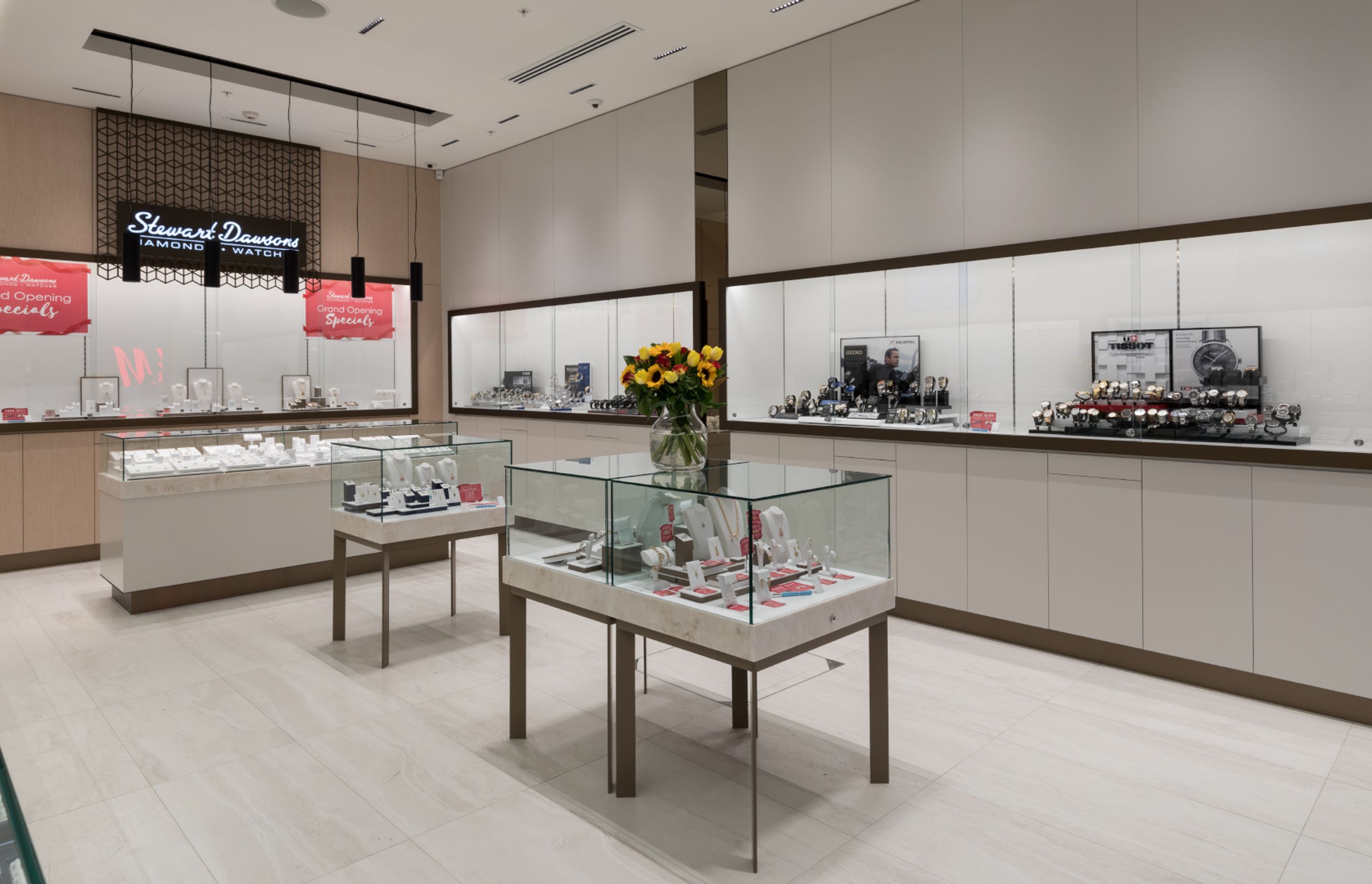 This Stewart Dawsons retail outlet demonstrates the ideal mix of general, accent and task lighting to create a cohesive lighting plan environment.