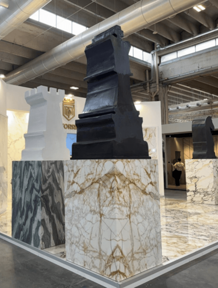 Bold statements in marble. This Marmomac booth highlights the drama of large-format slabs and book-matched panels, from striking grey veining to warm tobacco tones. It's about showing stone at scale, the way it will actually live in a project.