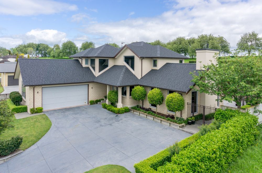 These Viking Certainteed Asphalt shingles impart a stylish and classical look to this home's roof.