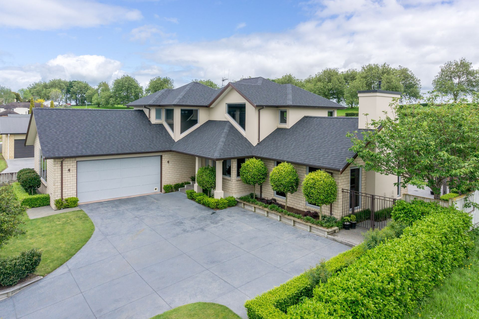 These Viking Certainteed Asphalt shingles impart a stylish and classical look to this home's roof.