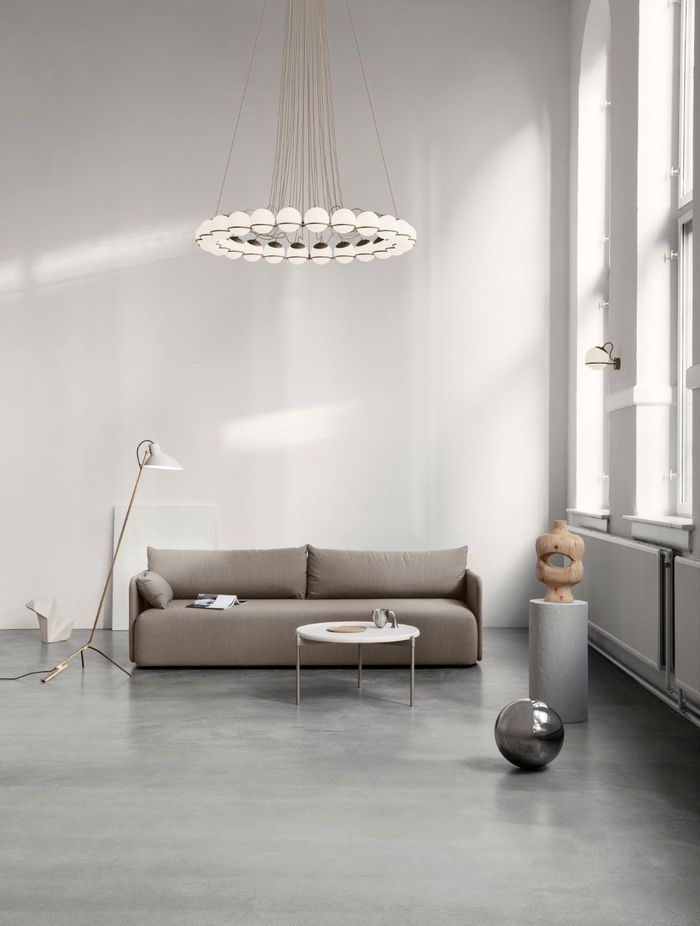 Astep defines the height and details in a room with a family of lighting objects from Gino Sarfatti, the 'Le Sfere' collection.