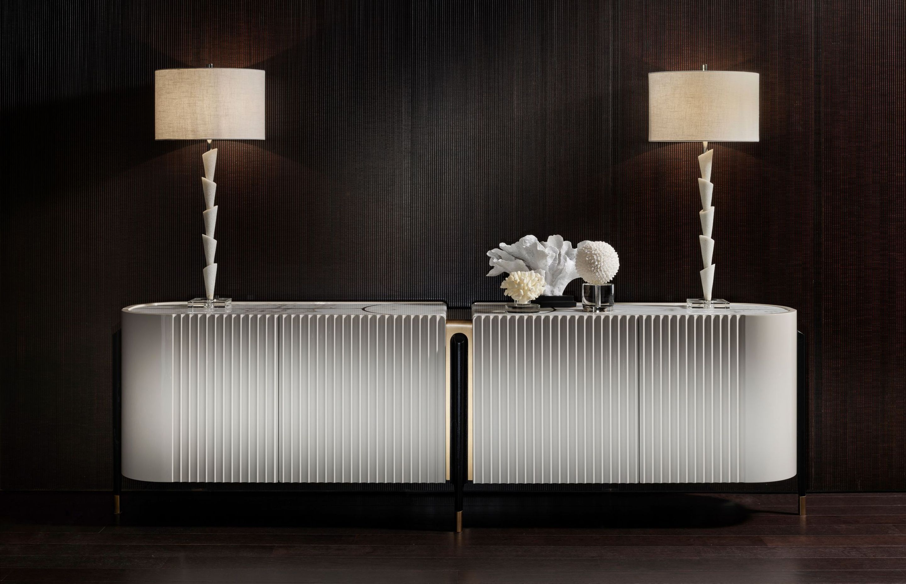 With it's symmetrical 'book end' design and fluted detailing, the Avenue Credenza is a statement piece suited to both contemporary and traditional design schemes.