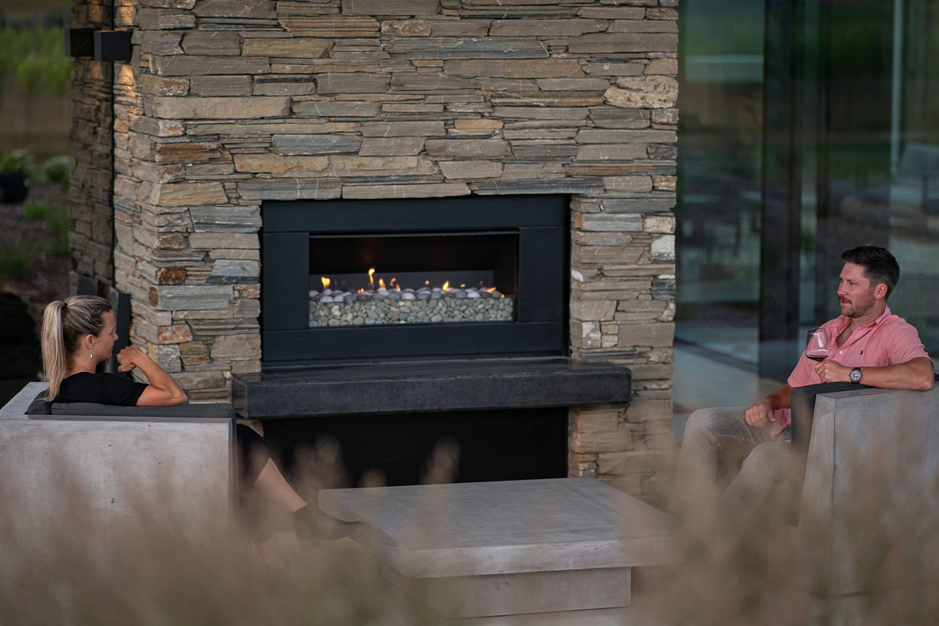 The Escea EF5000 Outdoor Gas Fireplace offers the homeowners quick convenient warmth and heat.