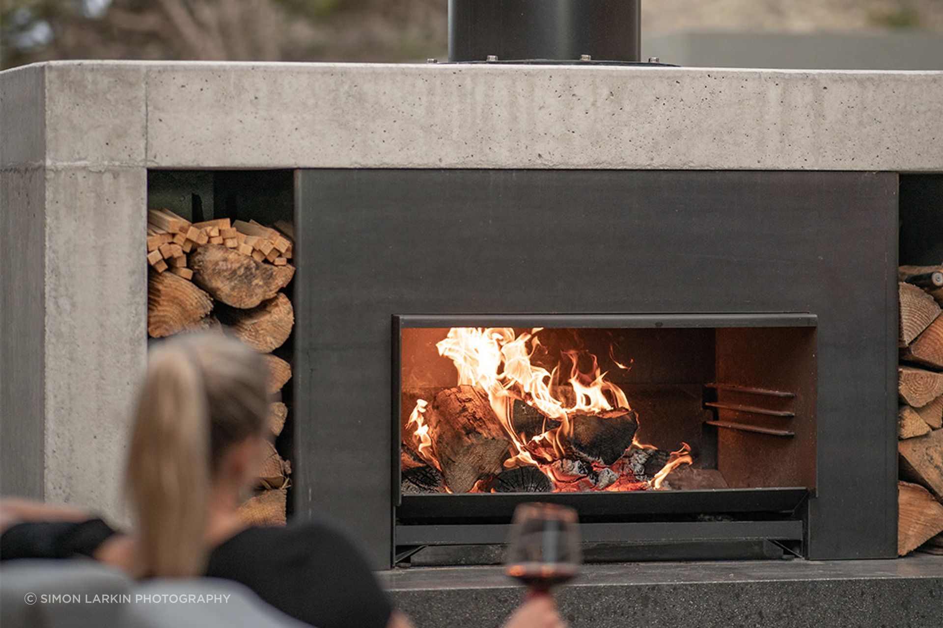 The Escea EW5000 offers three heights to cook on, and when not in use, easily slides under the ash pan.