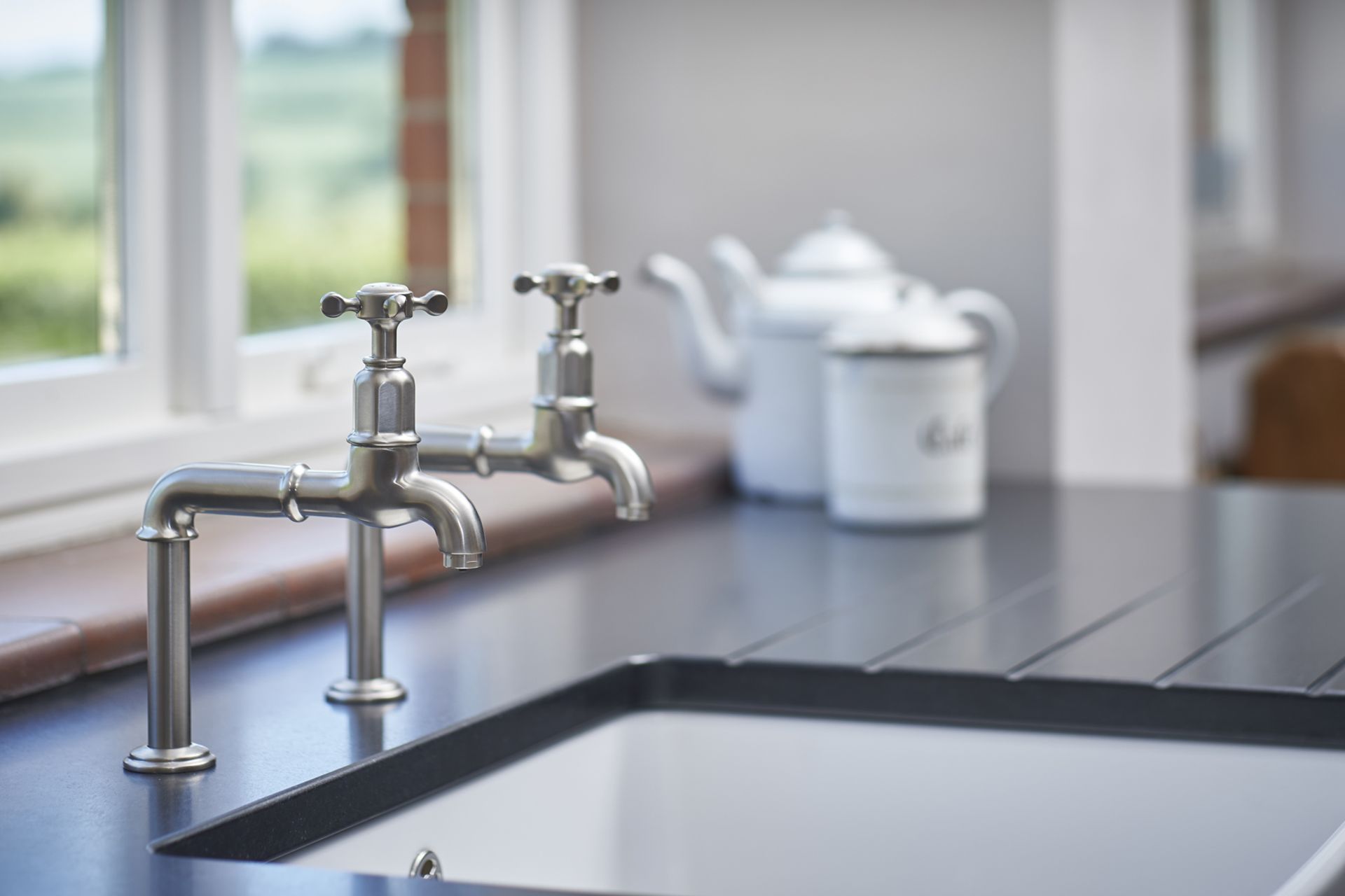 Pillar taps offer a traditional design.