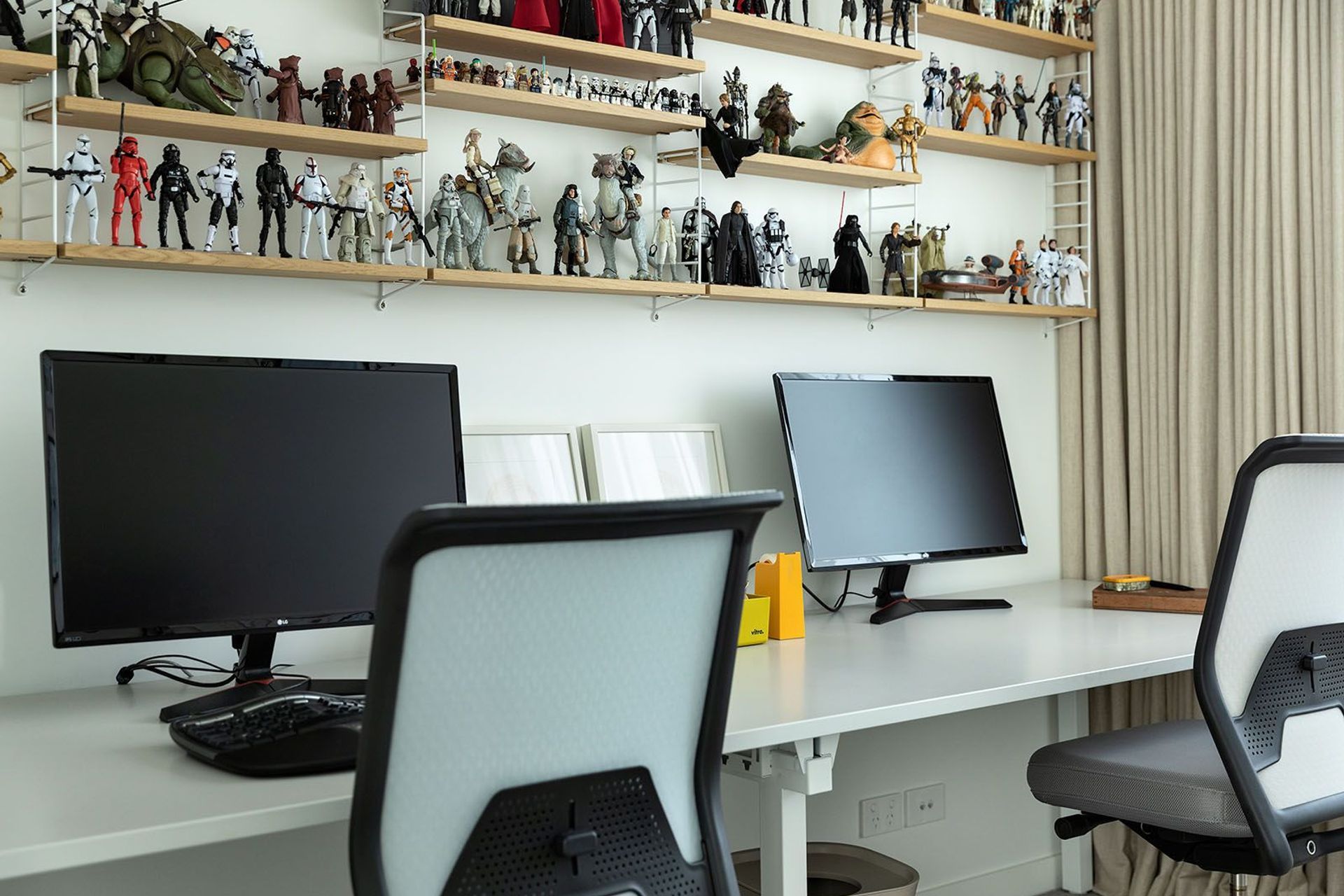 The upstairs' study/office features a collection of Star Wars figurines.