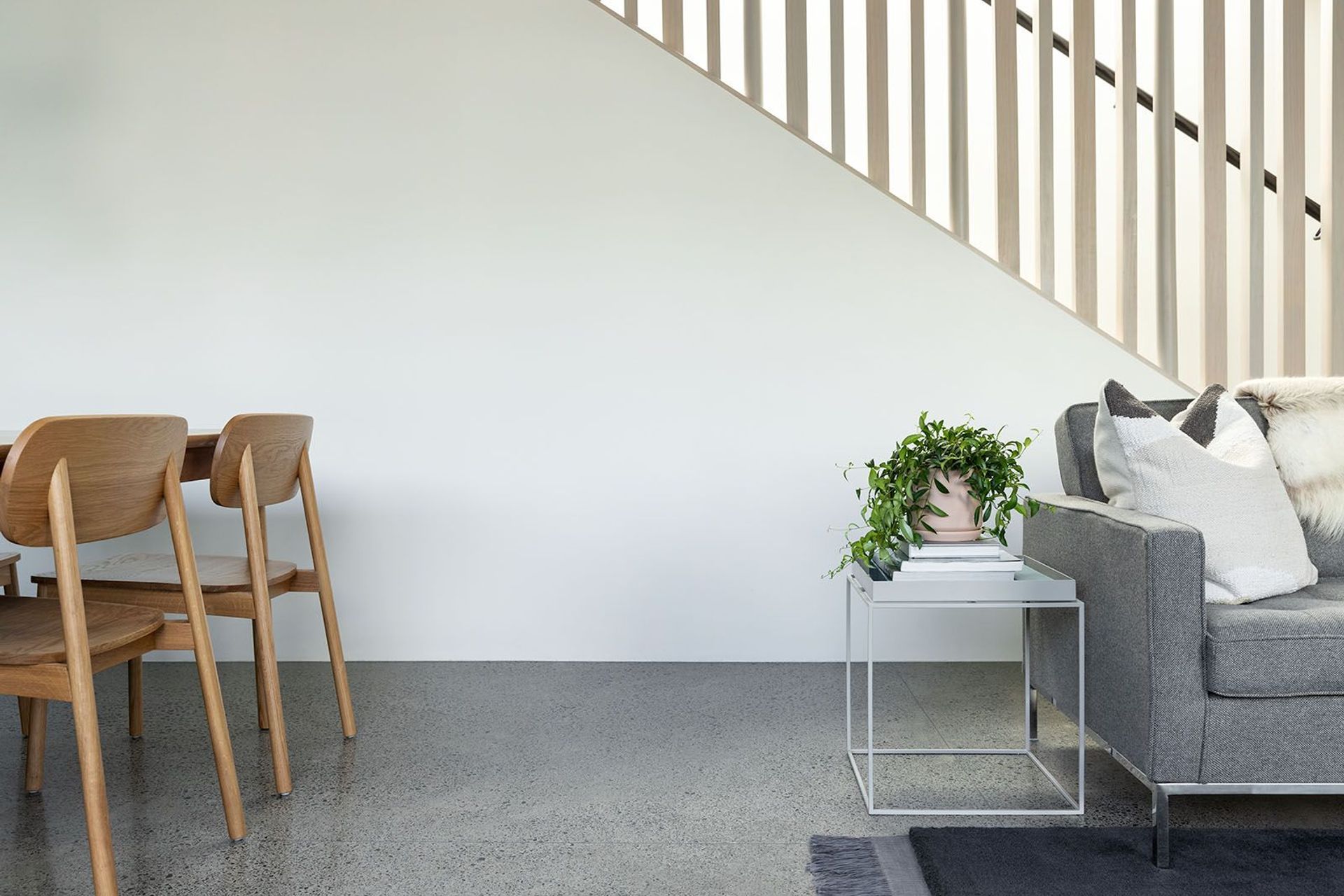 Neutral and pastel tones create an easy backdrop for the owner's furniture and objects.