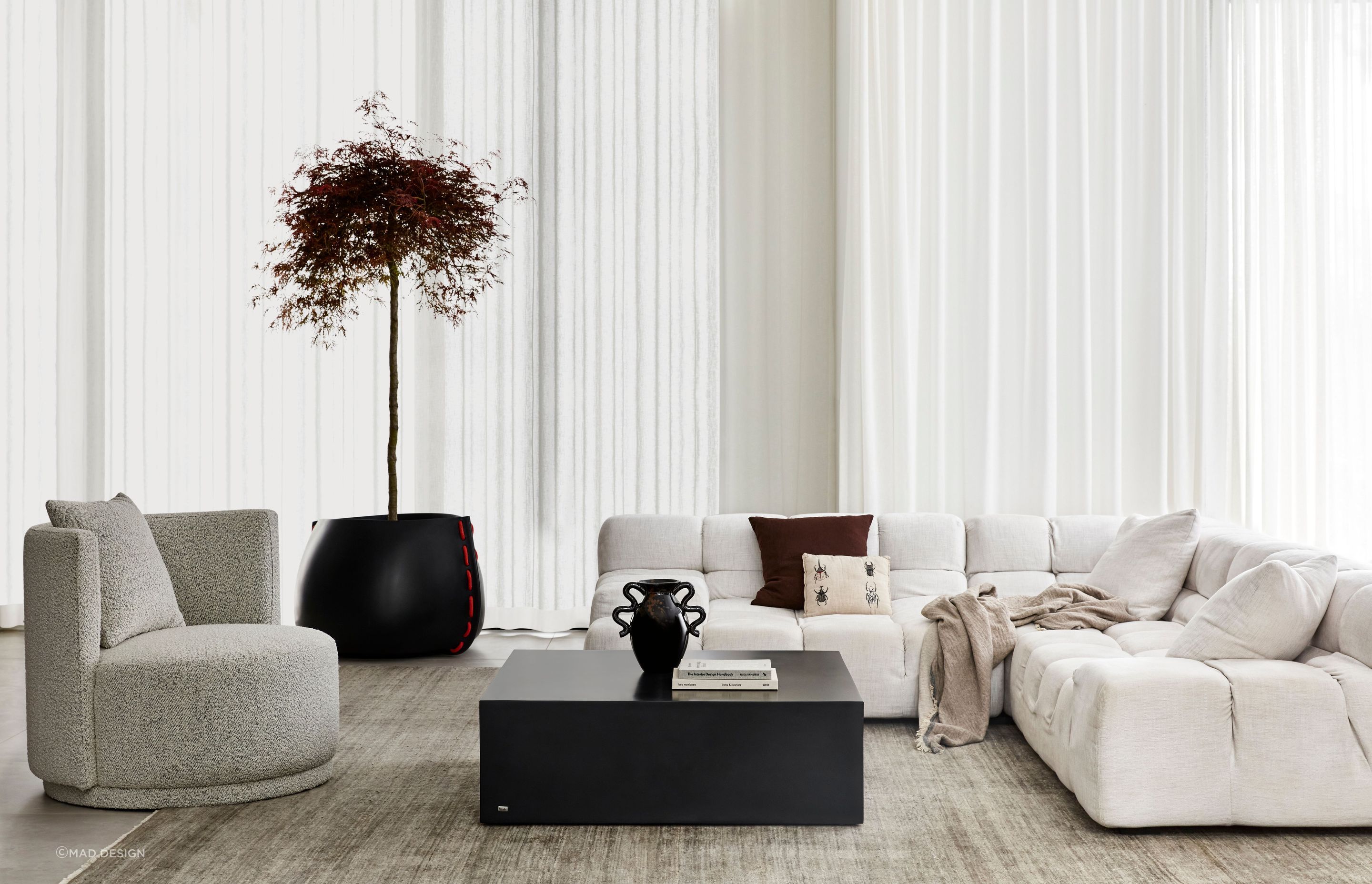 Bold yet minimalist, a concrete coffee table commands attention.