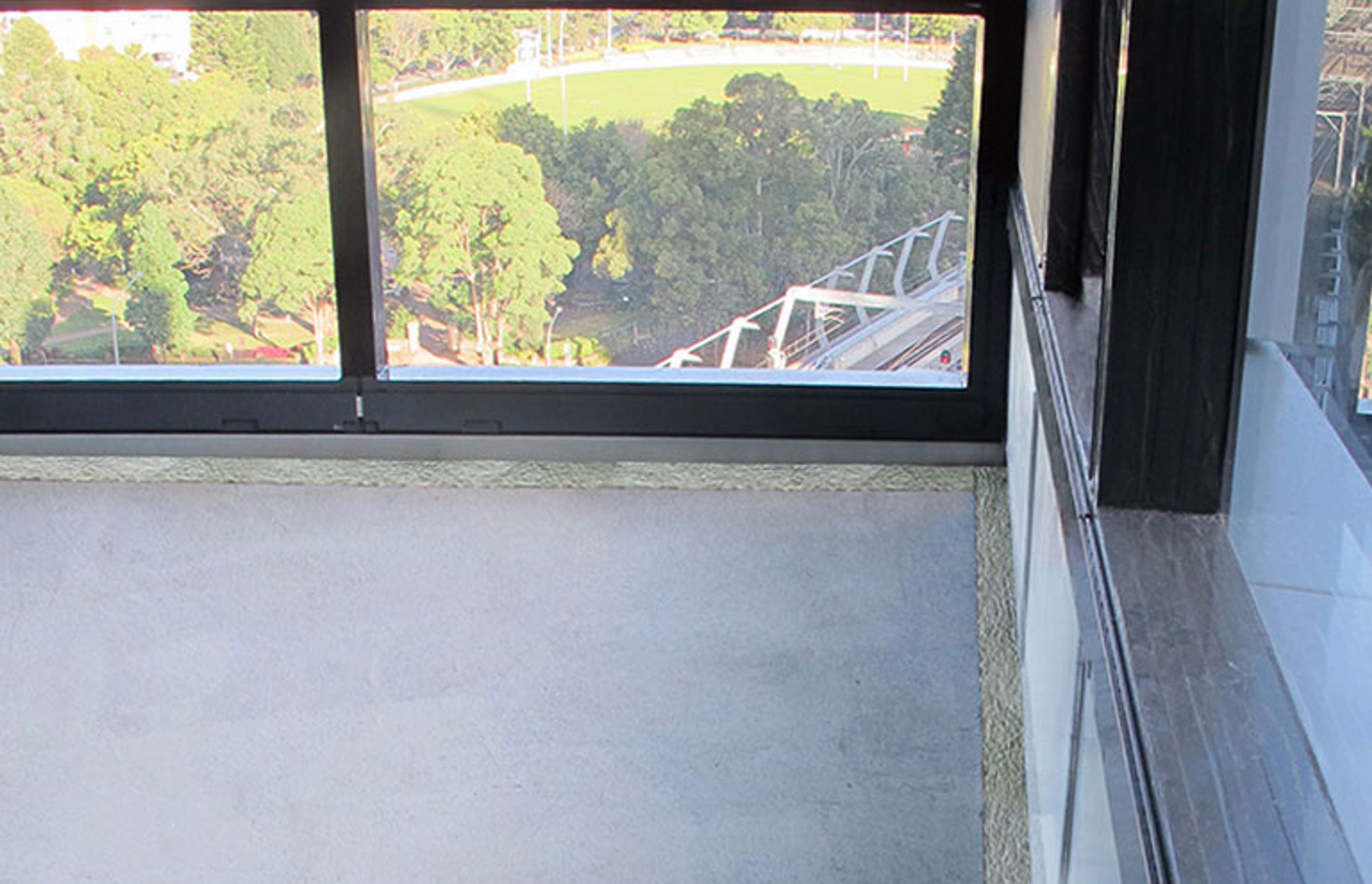 Curtain wall batts installed at slab edge