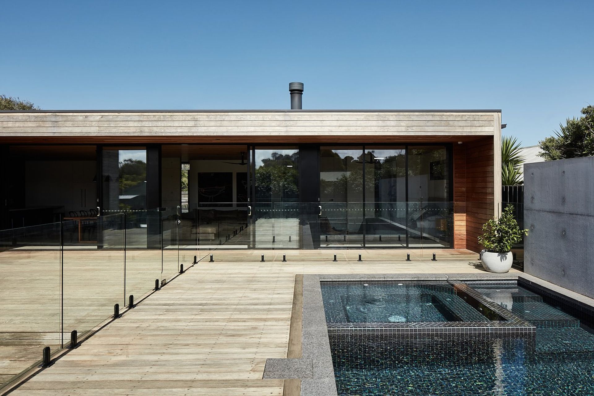 Concrete and Timber House by Planned Living Architects | Photography by Chris McConville