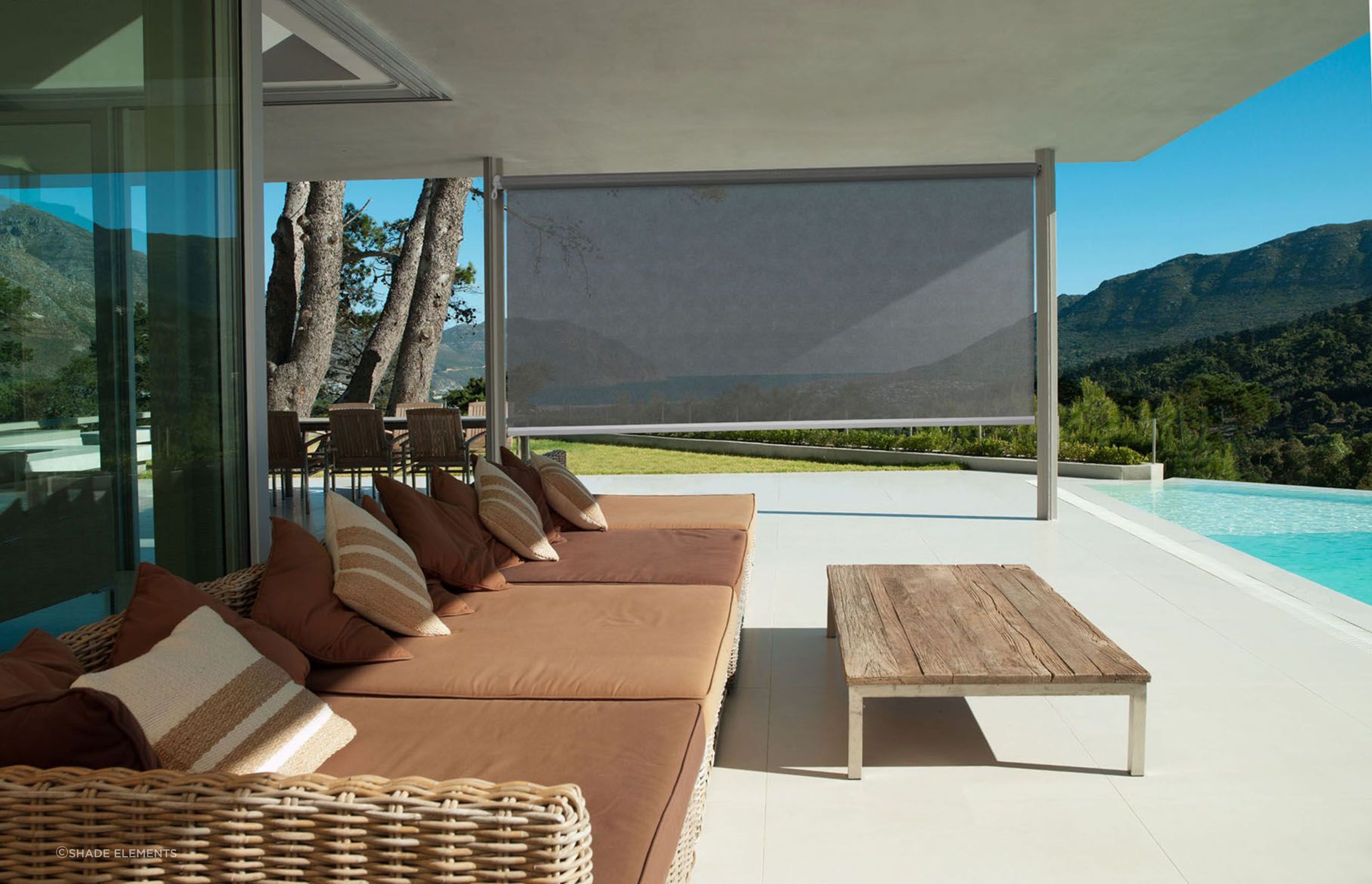 Outdoor blinds like the sleek Omni Screen provide privacy and protection where you need it most