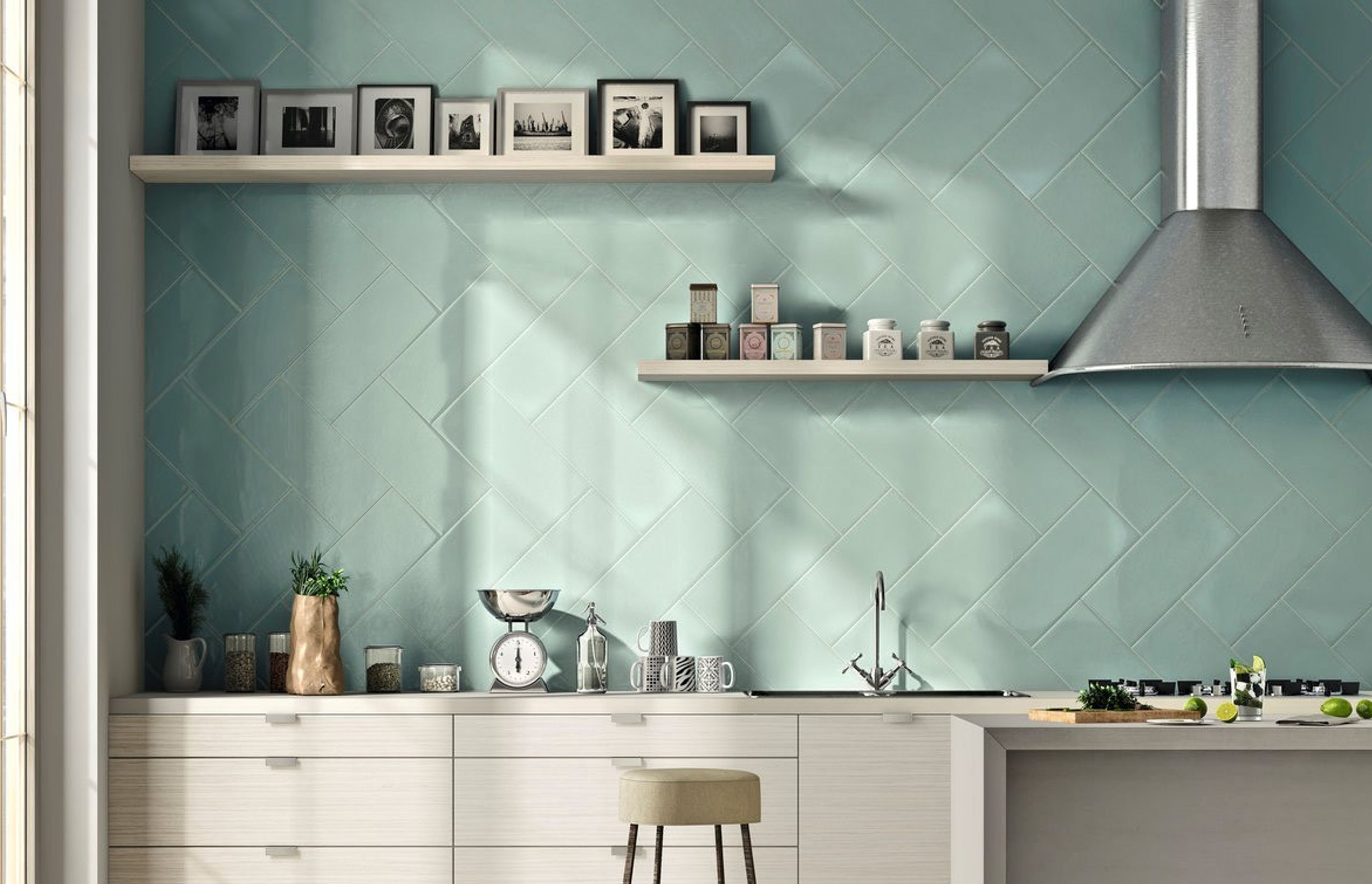 This splashback also acts as a feature wall with its cool aqua colour and brings a sort of serenity to the space when coupled with off white cabinet fronts. These glazed tiles have a smooth surface which are easy to clean. (Calx Aquamarina 100×300 tiles f