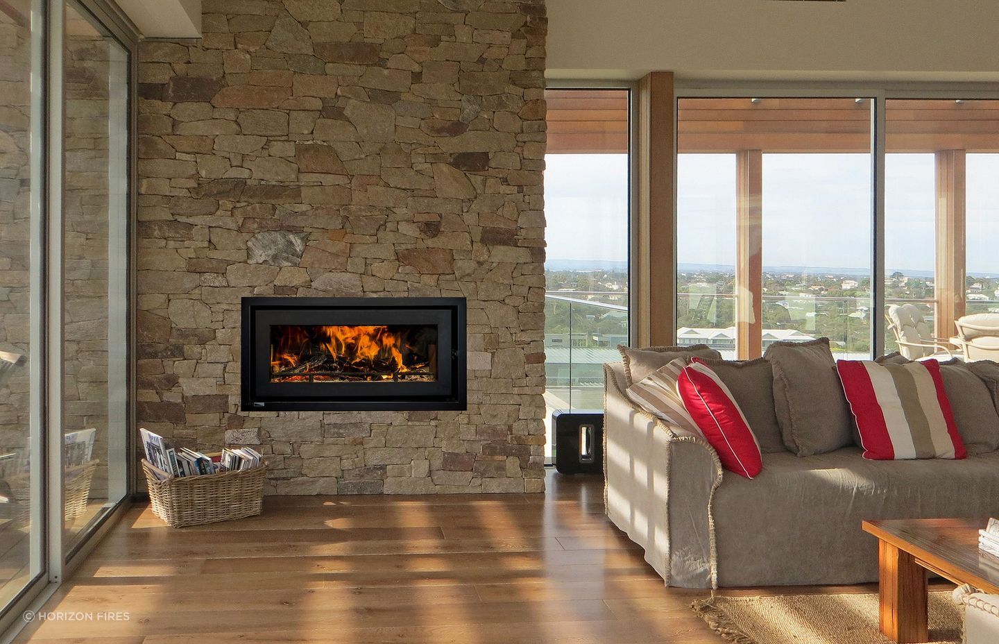 The simple elegance and sleek lines of the Kemlan Celestial 900, with the stunning natural stone feature wall.