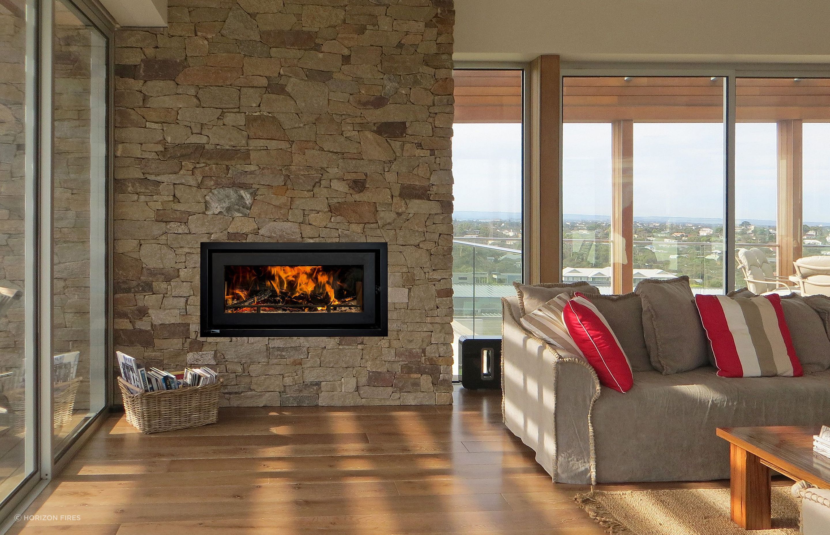 The simple elegance and sleek lines of the Kemlan Celestial 900, with the stunning natural stone feature wall.