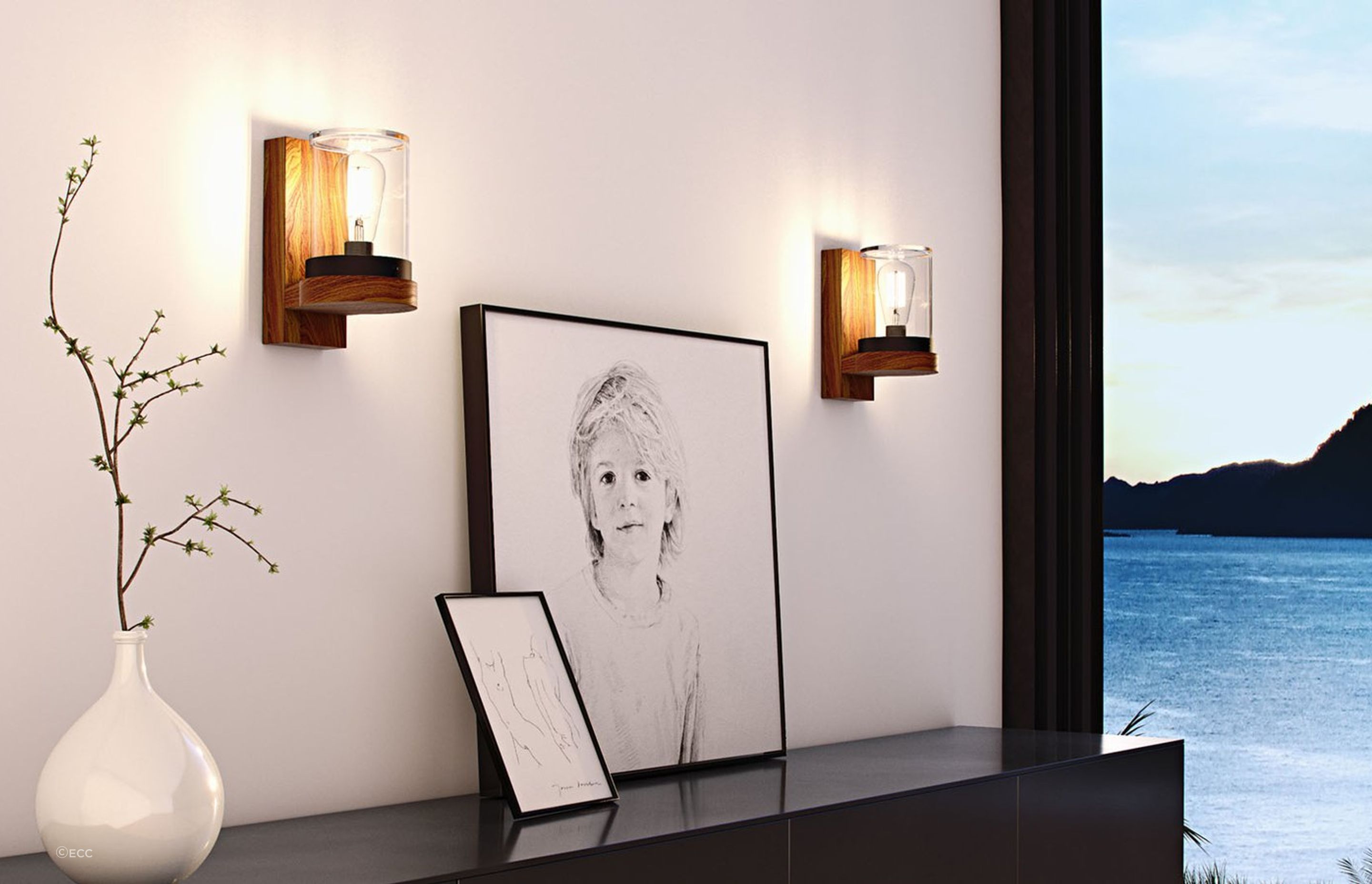 Your side walls are a great spot for lights like the Cloche Wall Light by Royal Botania