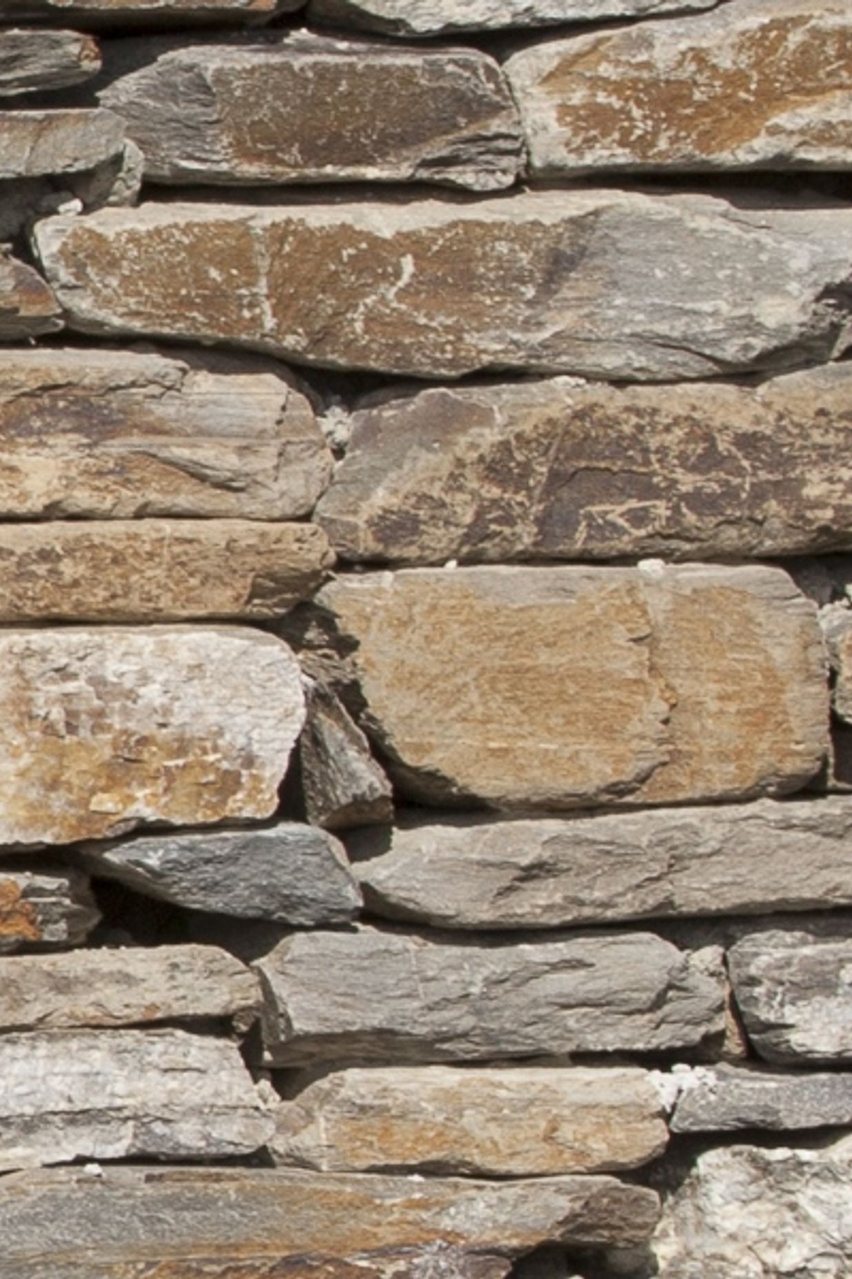 Cluden Naturals: We collect stone straight from the quarry with no guillotine used. The faces are rustic, more irregular and mostly brown with flashes of gold, grey and warm cream colours.