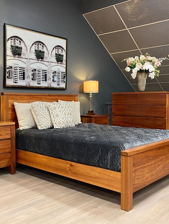 In bedroom renovations, it's common to utilise a consistent material, such as timber, for various fixtures to maintain a cohesive design
