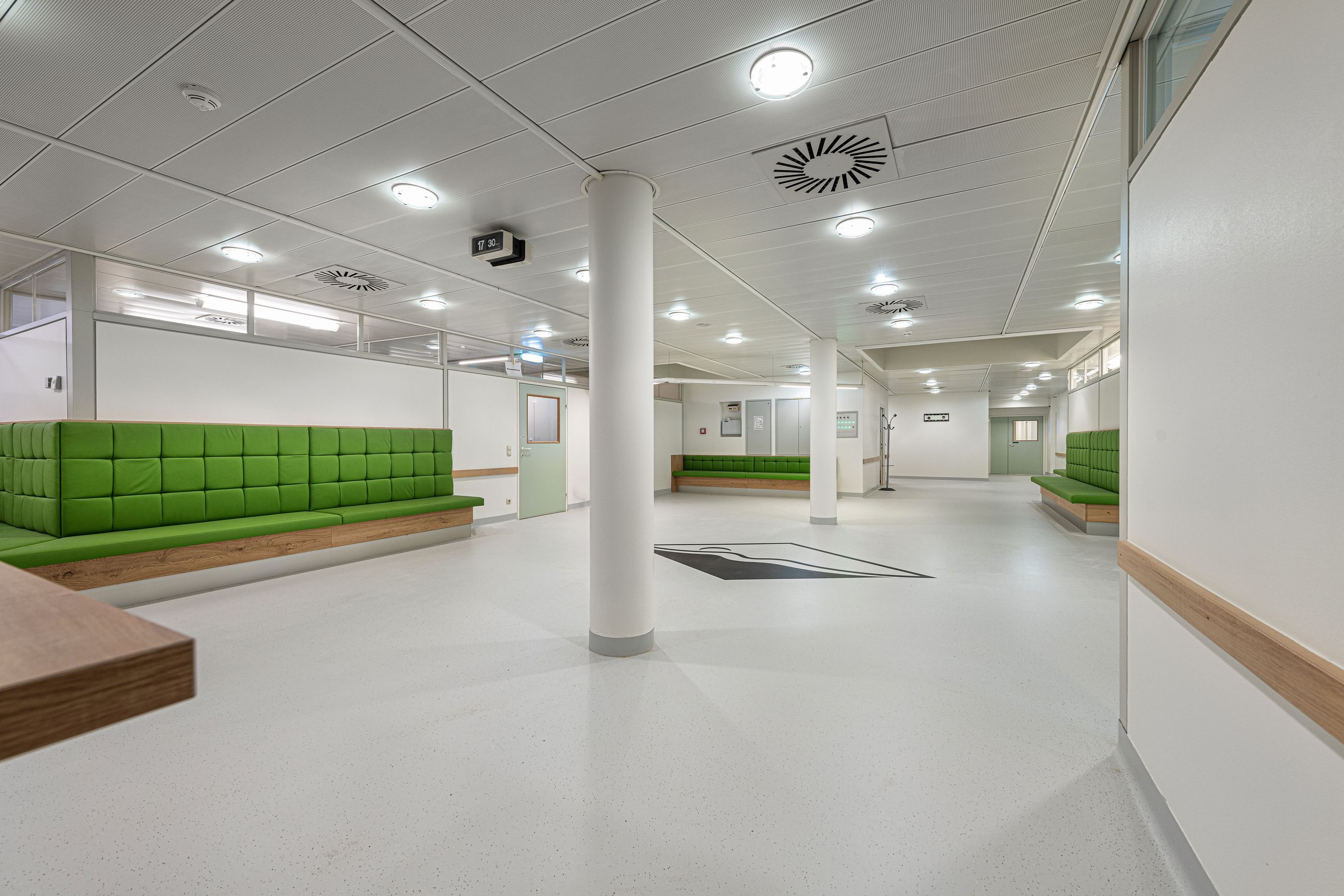 This healthcare waiting room is instantly refreshed with a pale floor colour and Bona Resilient coating.