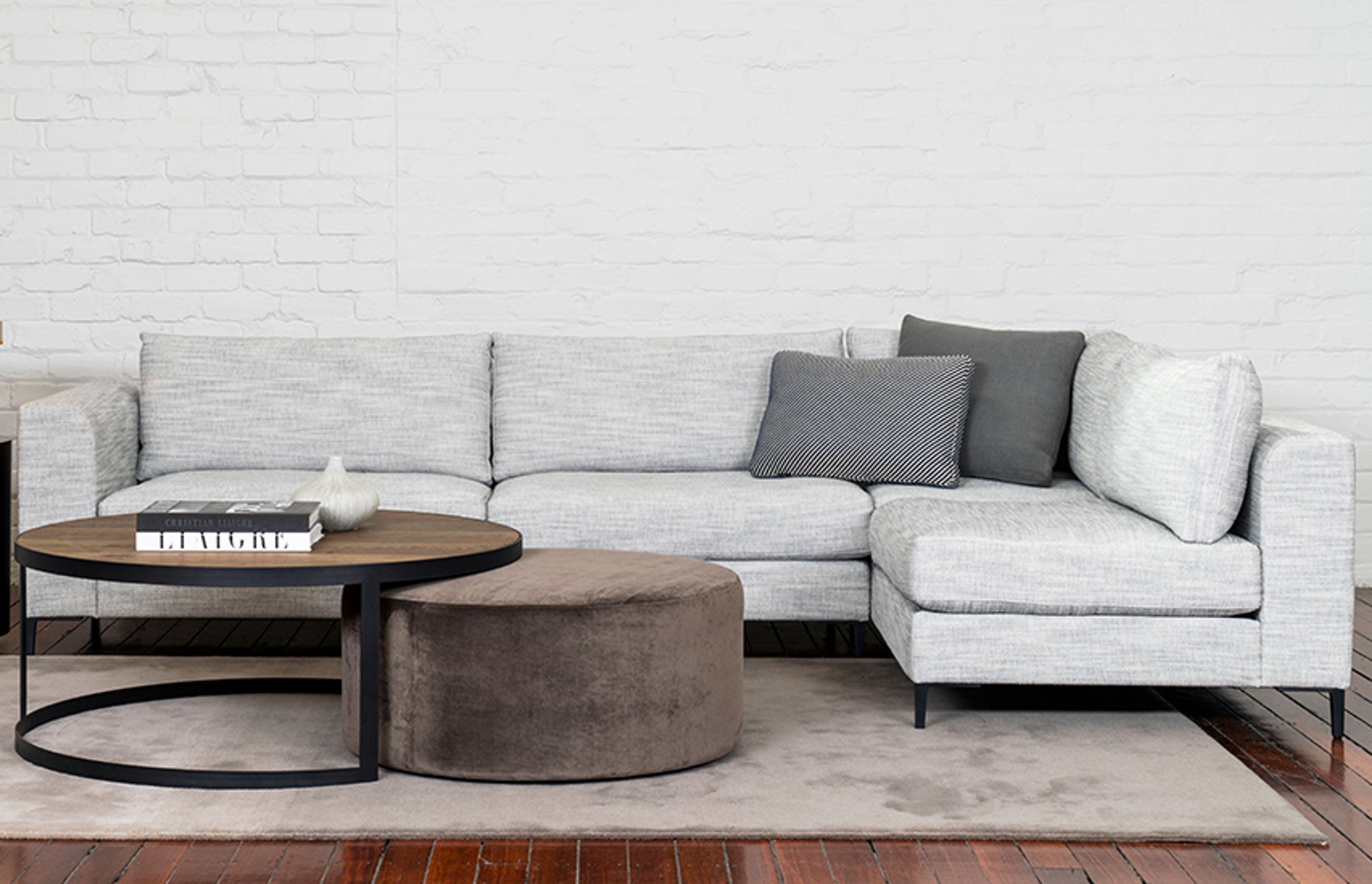 Nazare is a highly tailored sectional sofa with luxurious feather-infused cushioning to provide a soft, relaxed seating experience in sophisticated contemporary surroundings.