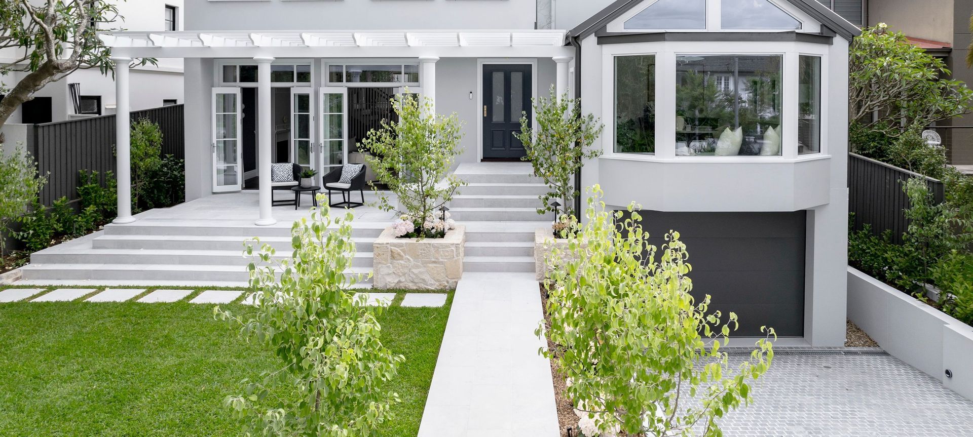 Luna Chiaro Limestone | Silhouette Grey Granite Cobblestones | HecticrAt architects | McRae + Lynch | Tass Construction Group