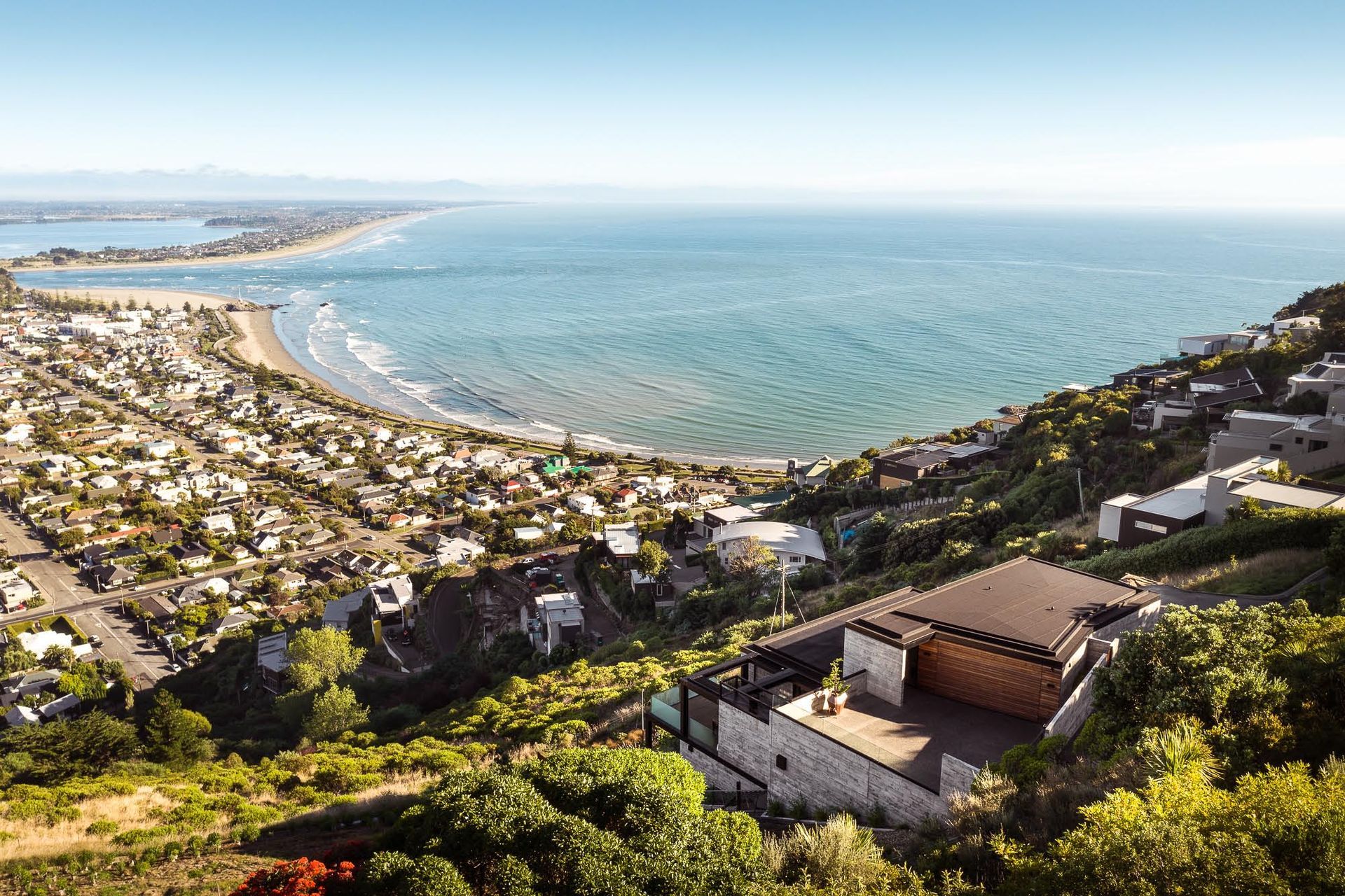 The home is built on the edge of a dormant volcano, on a site that has a 30 degree slope.