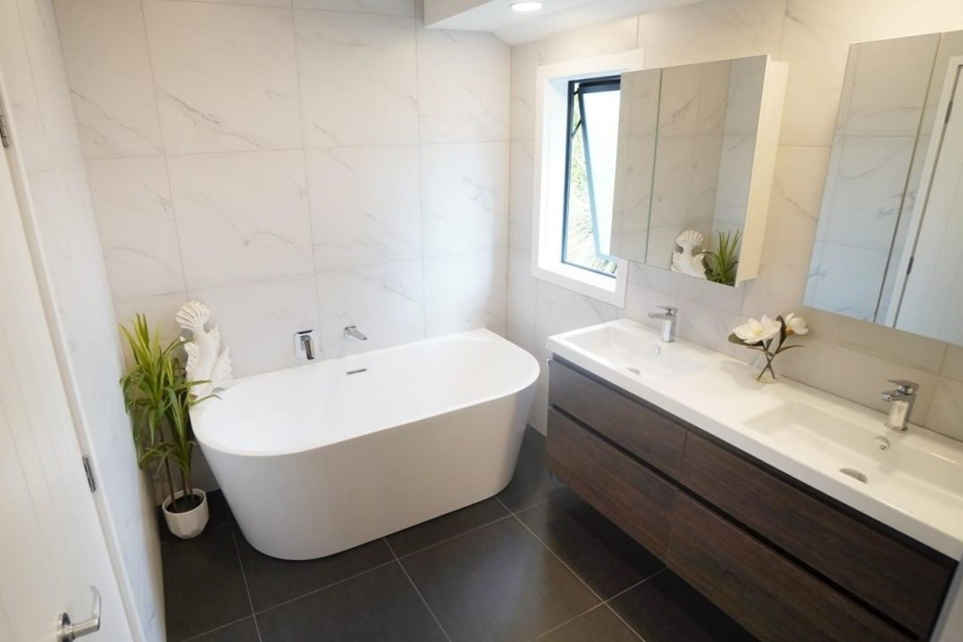 Use of colour on the floor and bathroom vanity