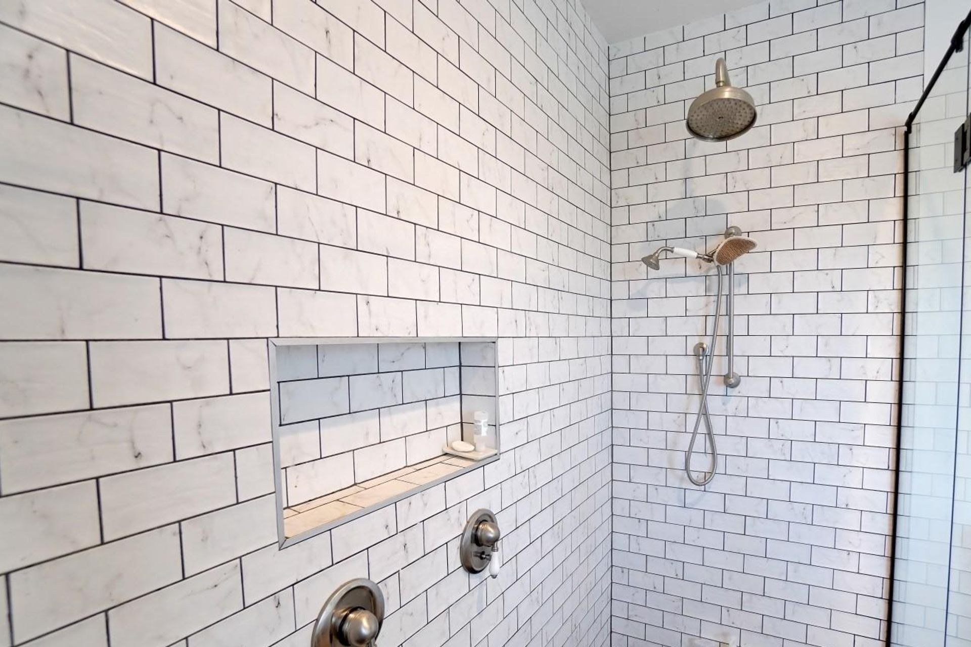 Tiling to the ceiling in vintage bathroom renovation