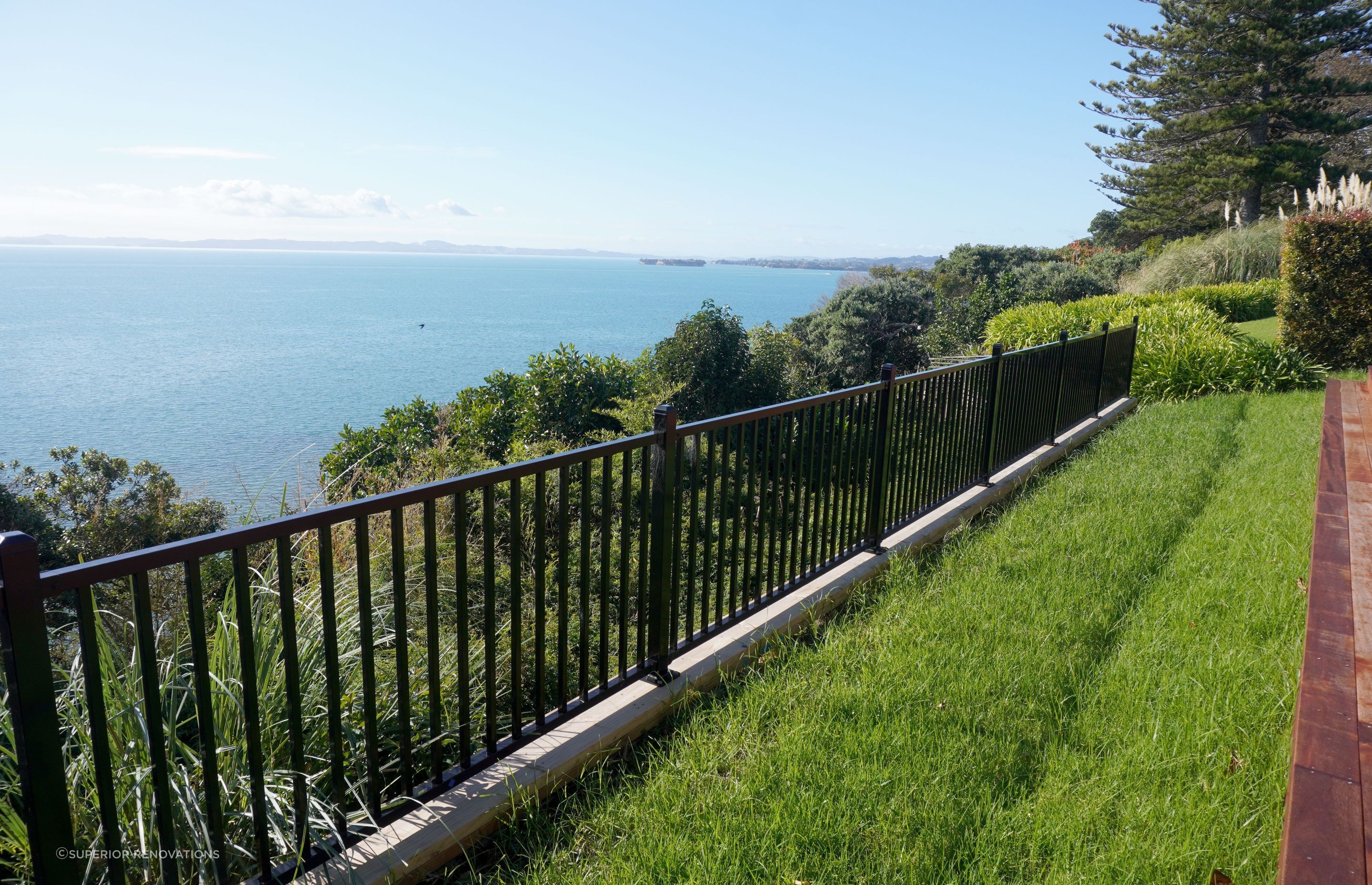 Alumininium Fencing in Mellons Bay which fences off the property from the cliff below.