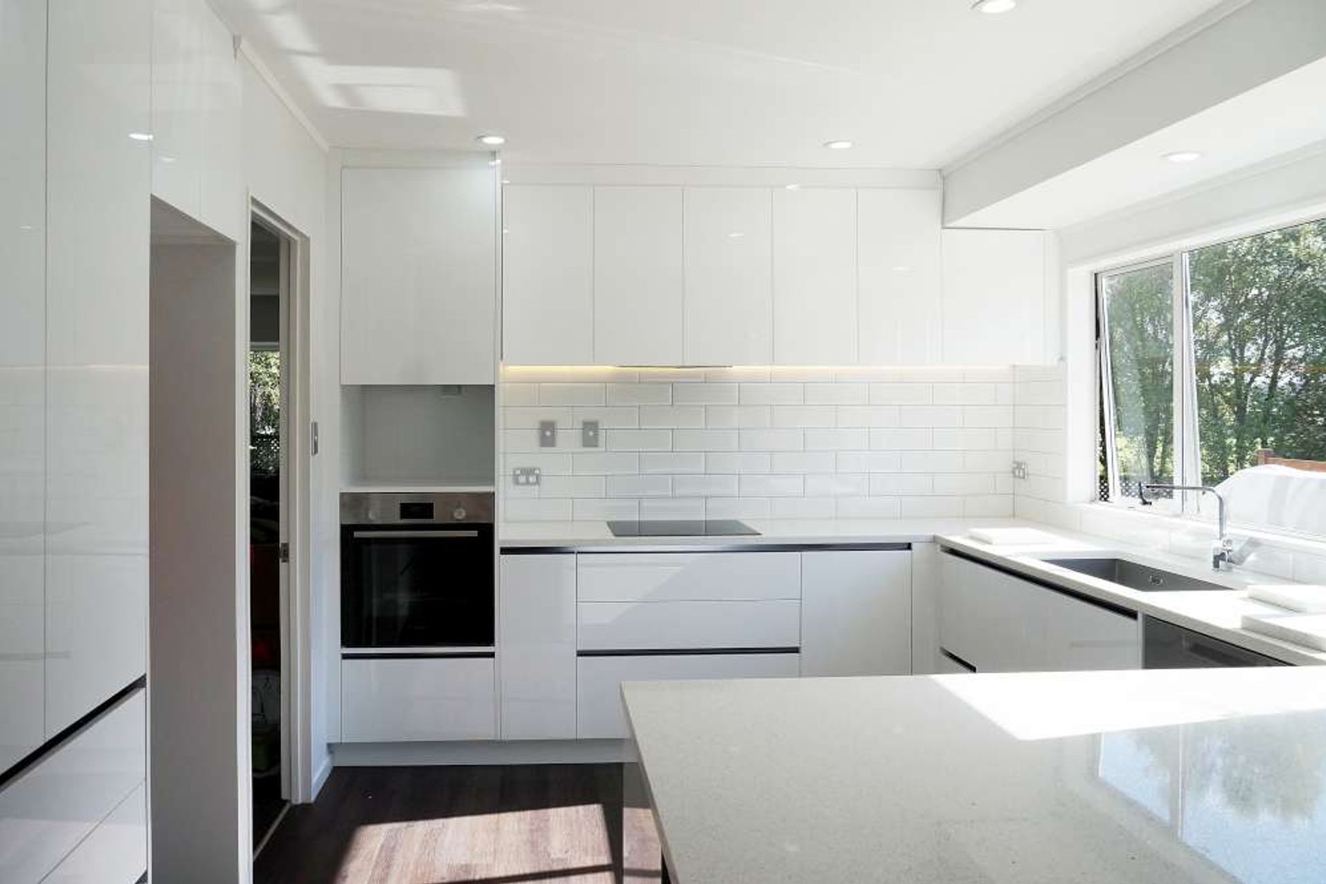 Kitchen renovation in West Harbour (see full case study by clicking on the picture)- Acrylic gloss finish cabinets custom built for low maintenance