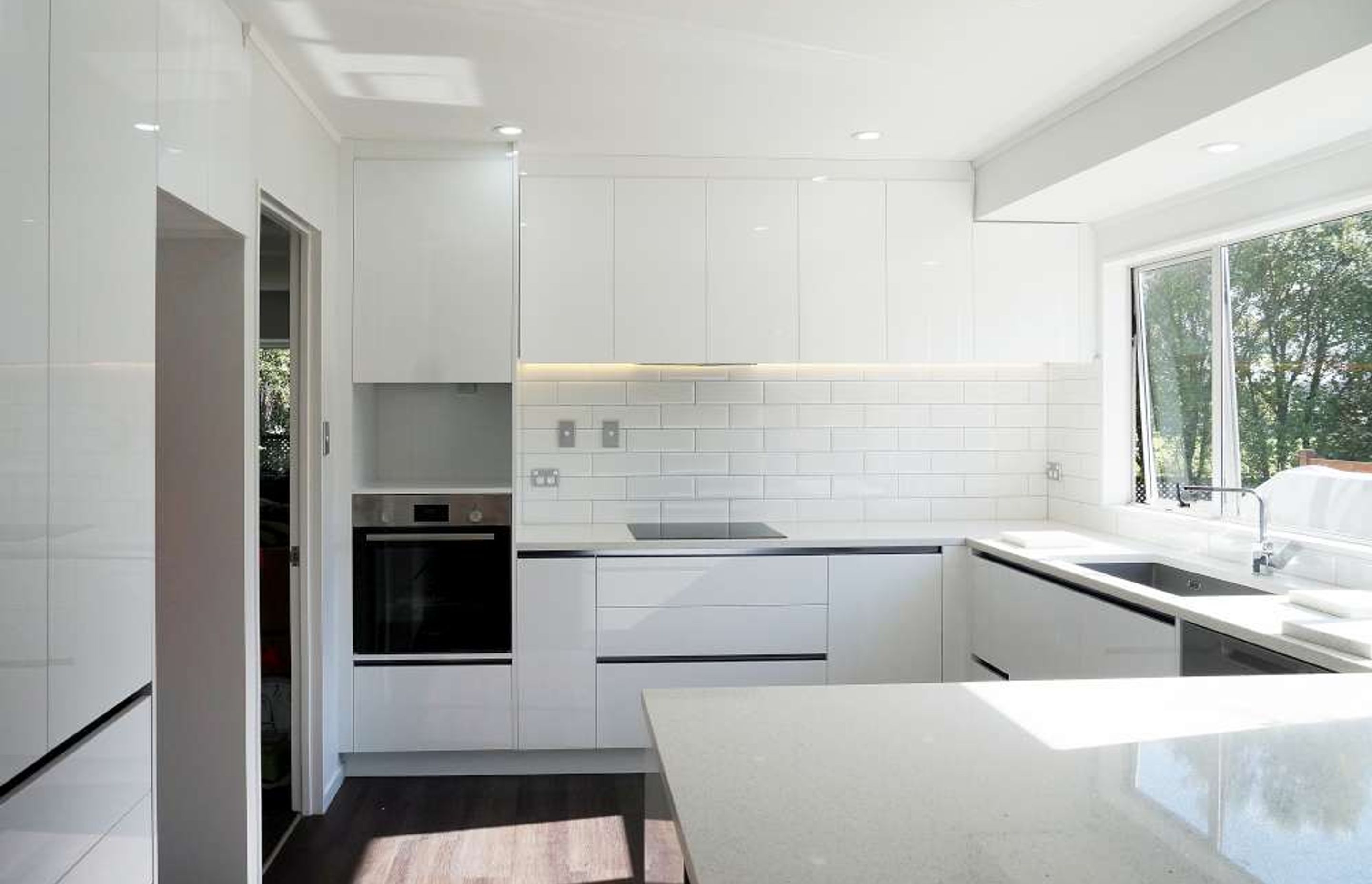 Kitchen renovation in West Harbour (see full case study by clicking on the picture)- Acrylic gloss finish cabinets custom built for low maintenance 