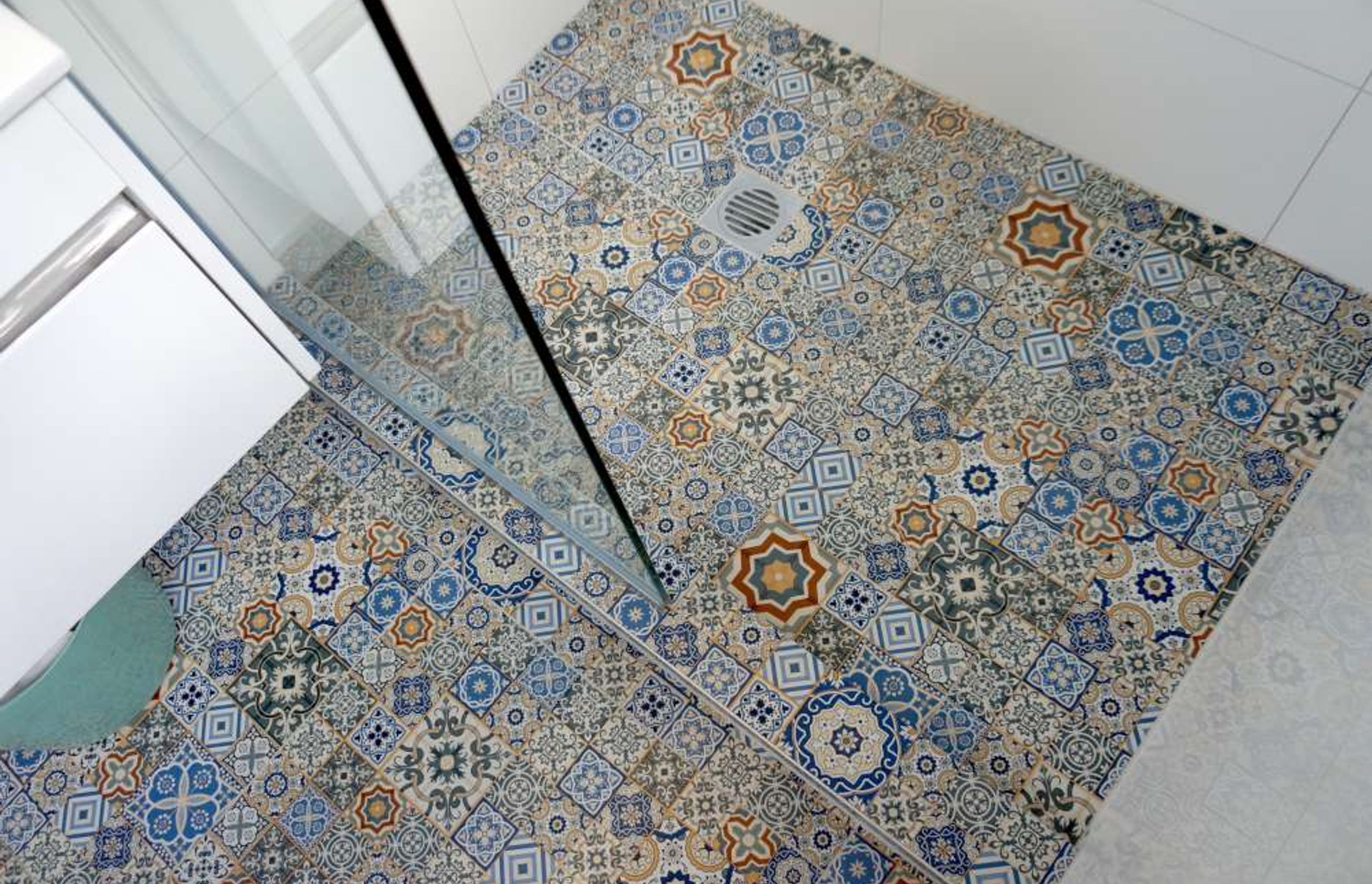 This bathroom in Hillsborough was fully renovated with Mosaic tiles used for the floors.